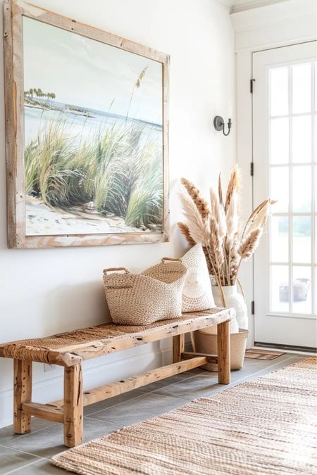Transform your walls into a gallery of summer dreams with vibrant artwork and decor that celebrates the season.

From beachy landscapes and tropical palm prints to whimsical seashell accents and driftwood sculptures, let your walls in places like your entryway and add a summer mantel vibe to tell the story of your favorite summer memories.

Coastal entryway | coastal decor | boho decor | boho entryway | summer entryway | summer entrance | summer foyer | beachy decor | coastal decorating | bench | floor vase | pampas grass 

#LTKHome #LTKFindsUnder100 #LTKSeasonal