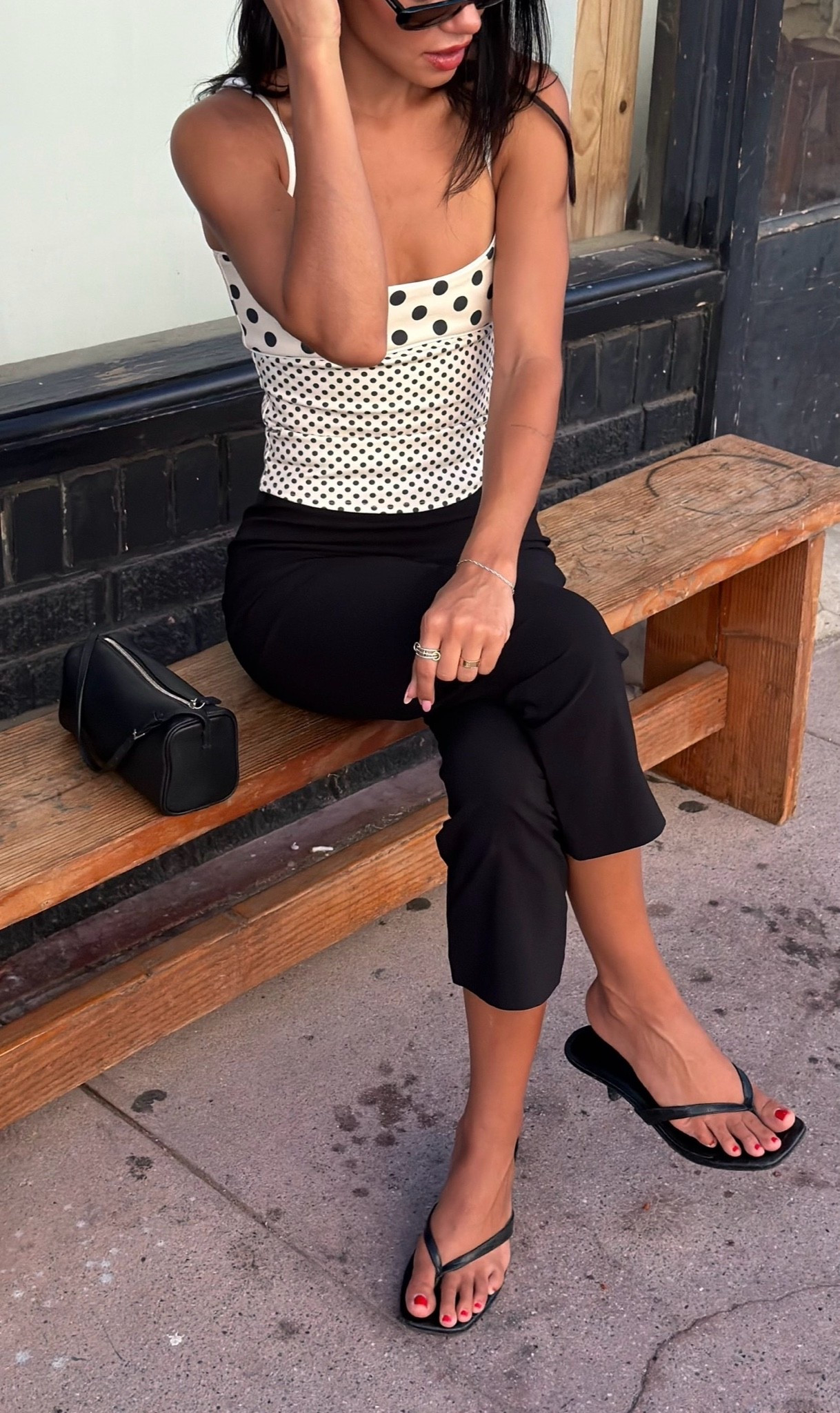 revolve polka dot top & black capris + Marc fisher heels

#LTKdayinmylife #LTKNYFW #LTKootd