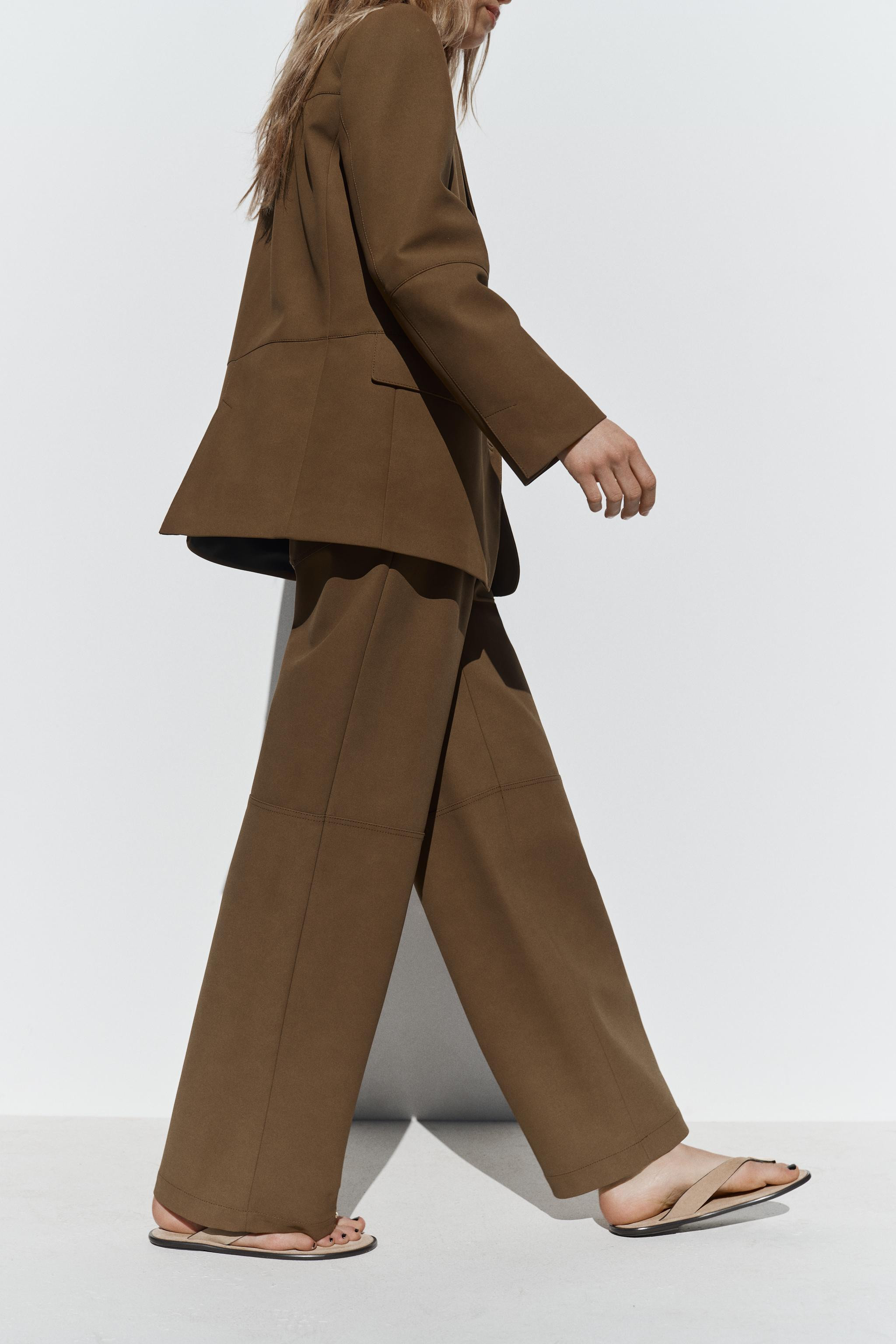 Mid-rise pants with front pockets and back patch pockets. Straight leg. Front zip, hook, and insi... | Zara US