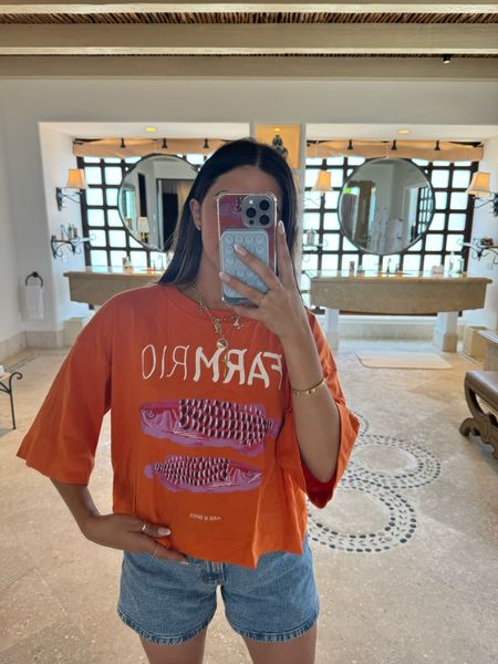 Top: medium 

Oversized but still cropped so it’s flattering with denim shorts. I like the sleeve length and the orange is bright but not neon! 

#LTKtravel #LTKstyletip