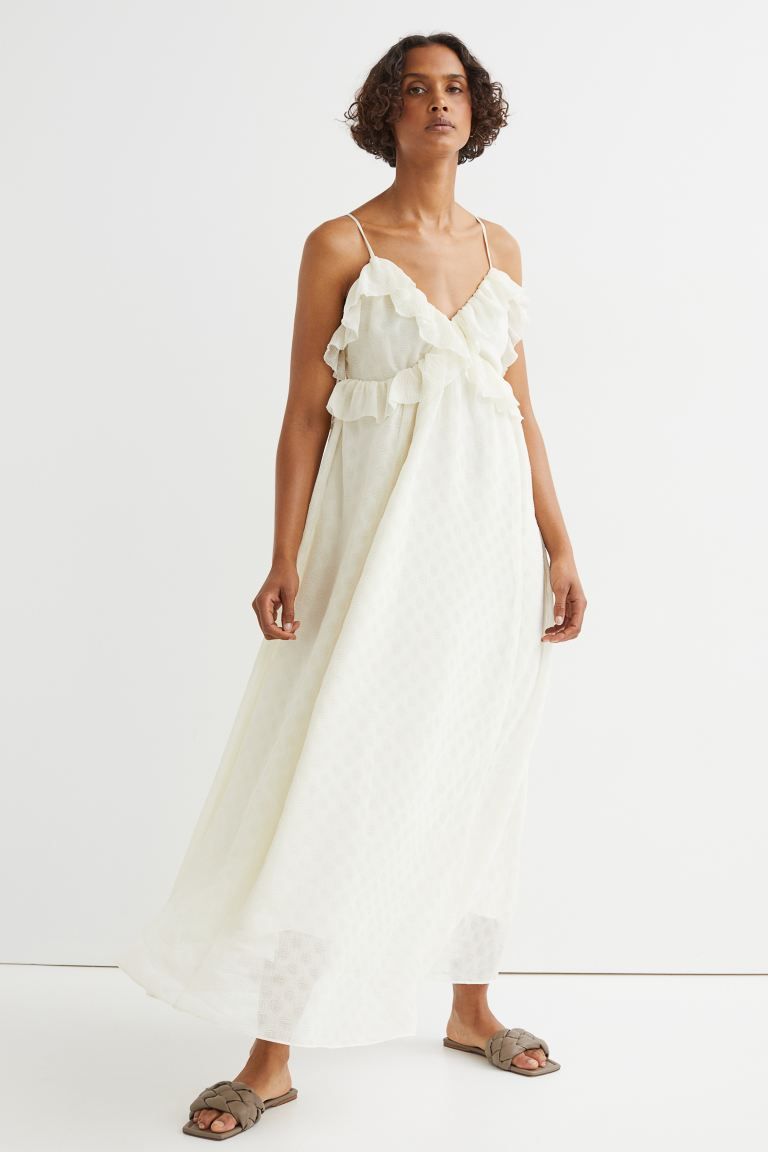 Calf-length dress in a softly draping crêpe weave. V-neck front and back with decorative flounce... | H&M (UK, MY, IN, SG, PH, TW, HK)