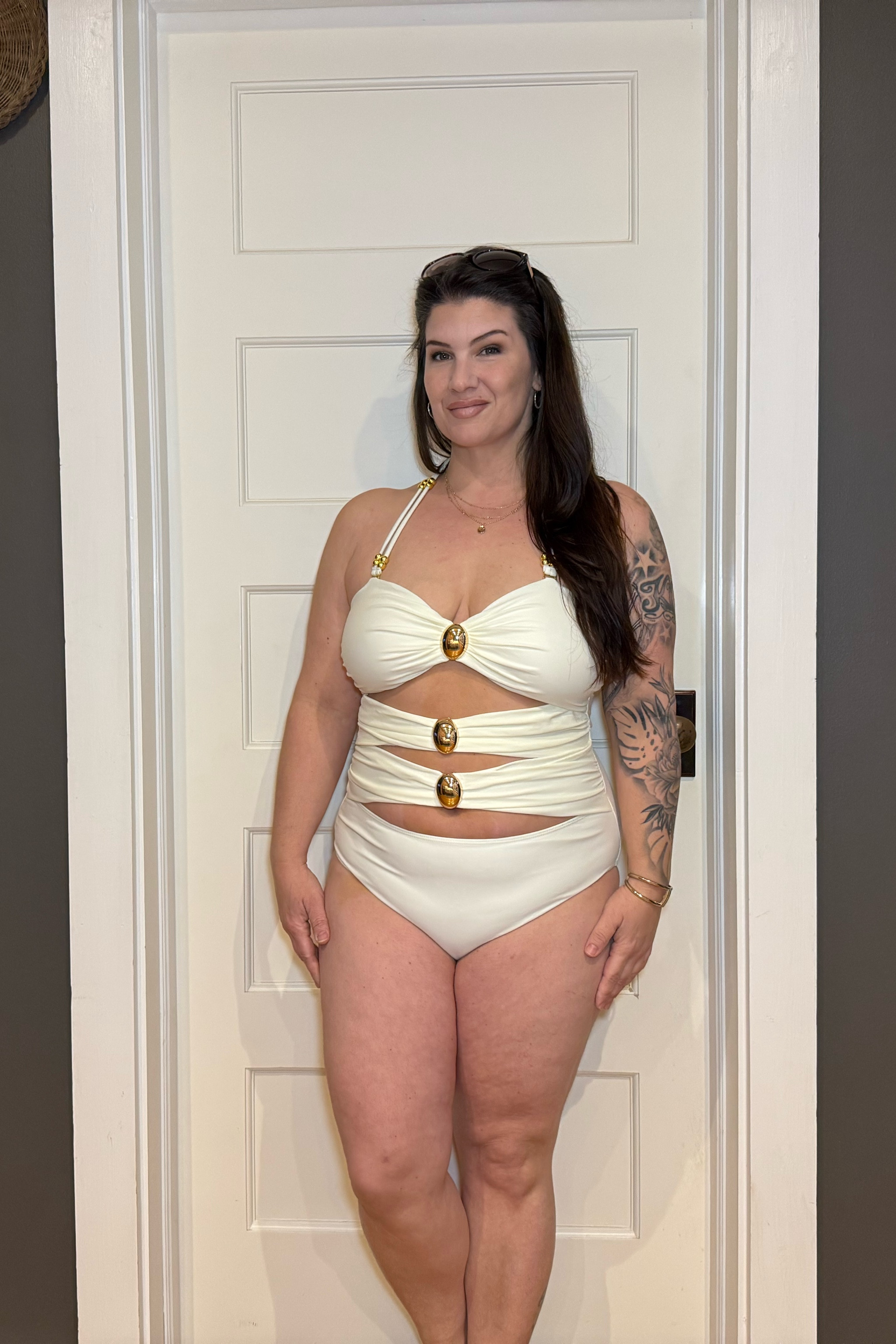 Elevate your swimwear! 

I wasn’t sure if I was going to like this swimsuit! 
I was honestly worried that my skin would be bulging out in between the bands across my belly. 
But this swimsuit is so comfortable.
The straps are adjustable/ removable, and the gold accents in the center and the straps can be moved as well. 

Such a cute piece. 

#LTKMidsize #LTKOver40 #LTKSwim