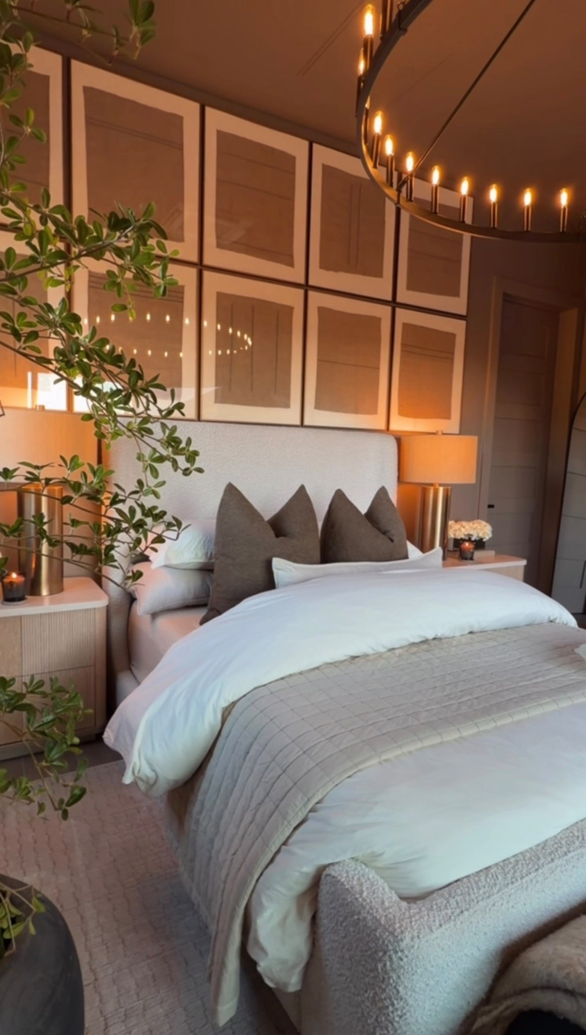 Soft, airy layers bring a fresh RH-inspired bedroom to life with light spring home decor touches. 🌸

A stonewashed quilt, styled decor books, and a lumbar pillow create relaxed texture, while the  wagon wheel chandelier, and neutral rug add warmth and timeless character. Finished with a realistic faux tree, this look is perfect for neutral bedroom styling and elevated luxury home decor with soft spring vibes. 🌿✨

#summerthompsonstyles

#LTKHome