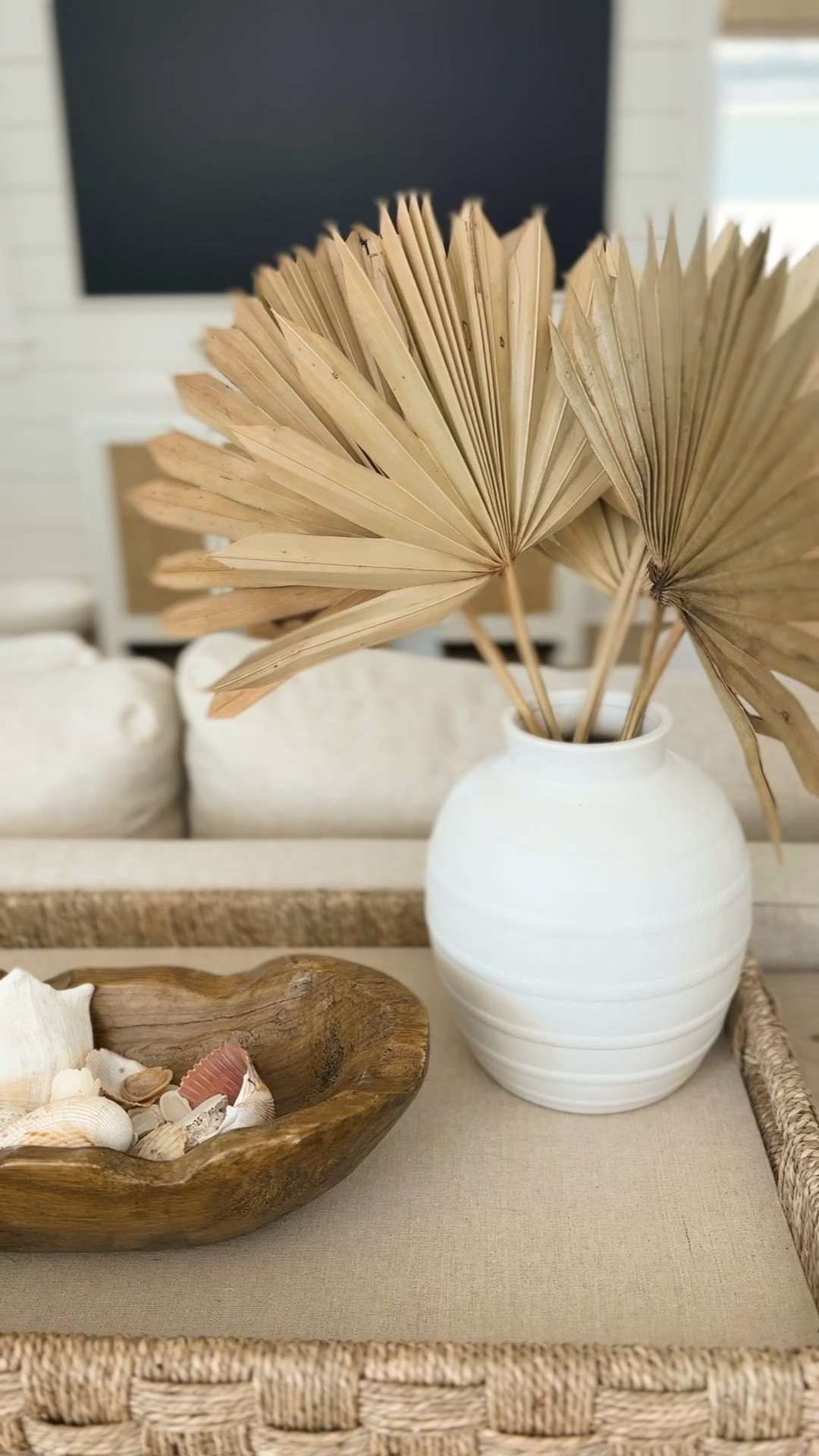 These dried fan palm leaves may be one of my favorite fall decor finds ever! So perfectly coastal yet the brown tones work for fall! Also linking this scalloped wood dough bowl (filled with seashells I’ve collected), white vase, woven tray, our sectionals came cabinet, long console table and blue gray lamps.
.
#ltkseasonal #ltkhome #ltksalealert #ltkfindsunder50 #ltkfindsunder100 #ltkstyletip coastal fall decorating, fall loft, fall living roomm

#LTKSaleAlert #LTKSeasonal #LTKHome
