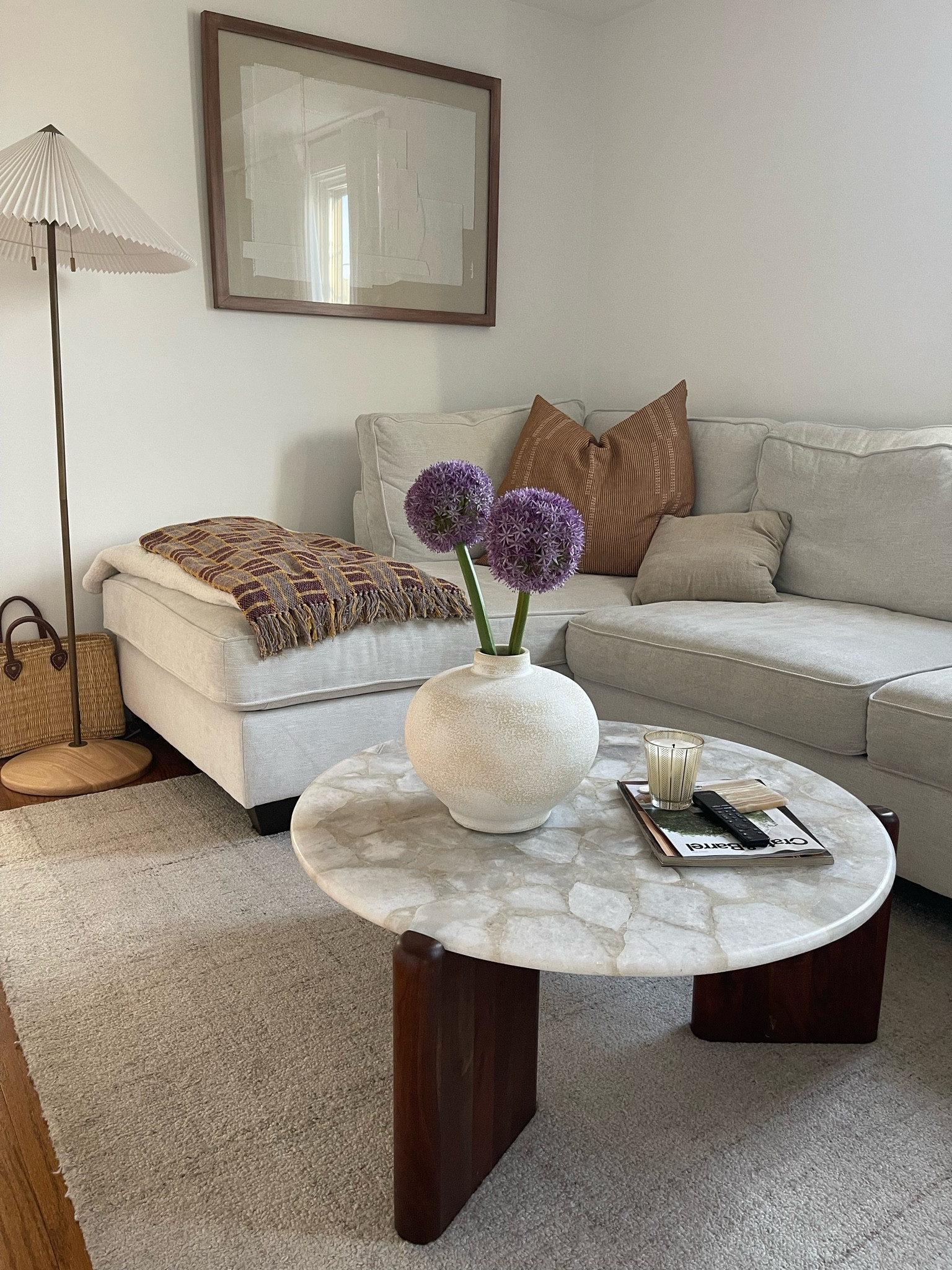 Flower refresh ! Sofa is Jordans Furni. Photo/Art is Home Goods.

#LTKunder100 #LTKhome #LTKSeasonal