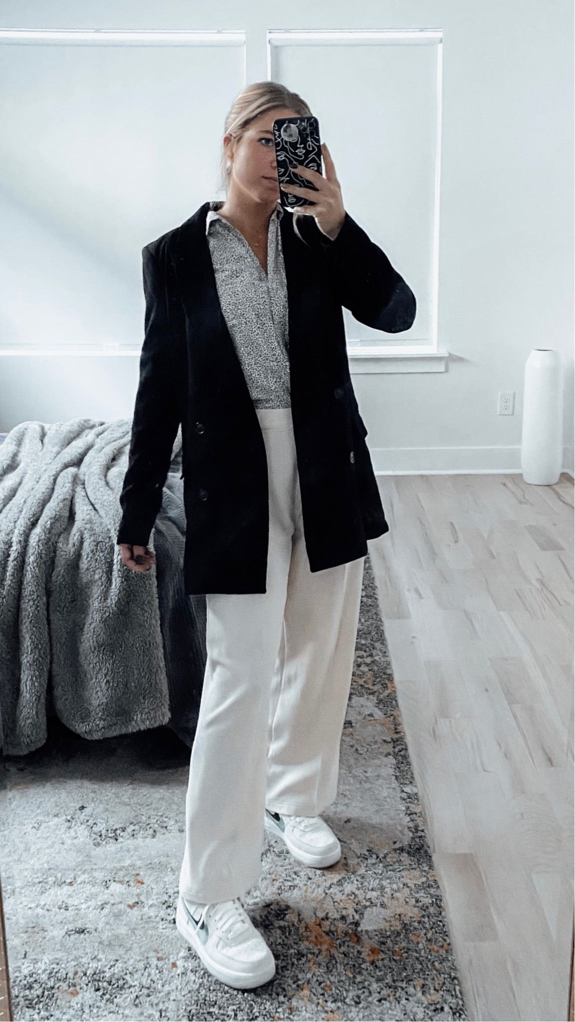 Oversized black blazer with off white trousers and Nike airforce one’s 

#LTKworkwear #LTKshoecrush #LTKstyletip