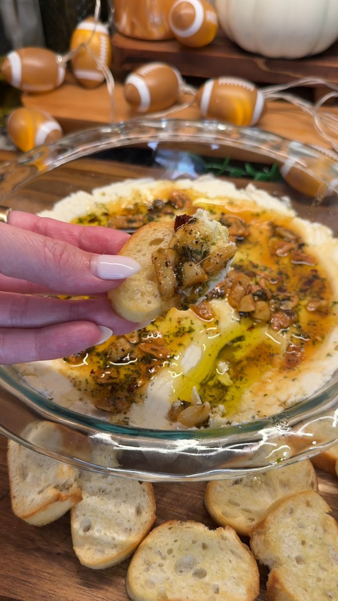 tastebud touchdowns, week 4: hot honey boursin dip🏈✨🍯

this dip will be your new obsession for game day! super easy & packed full of flavor- this appetizer is a must for your game day spread!
#gamedayhosting #kitchenfavorites #cookingmusthaves #kitchenessentials

Ingredients:
- 8 cloves garlic, roughly chopped
- 1/3 cup olive oil
- 1 tsp red pepper flakes
- 1 tsp black pepper
- 1/2 tsp salt
- 1 tsp onion powder
- 2 tsp dried parsley
- 2 packs (10 oz) @Boursin cheese
- 2.5 tbsp hot honey

#LTKHome #LTKFamily #LTKSeasonal