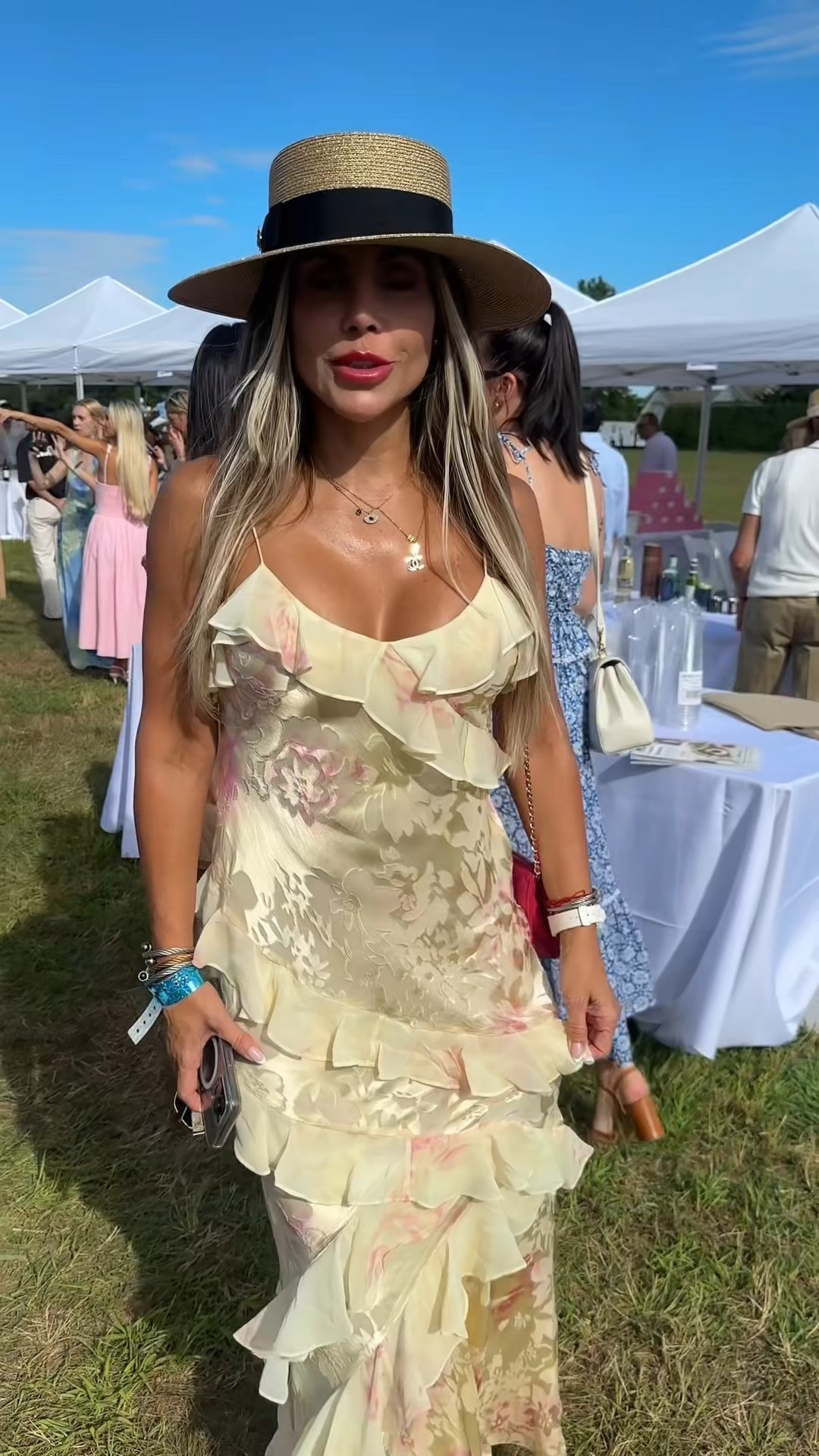 ⚜️ A vision in LoveShackFancy. Soaking in all the luxury details: that perfect deep pink Chanel bag, gold Ferragamo wedges, layers of stunning David Yurman, Dior earrings, a Chanel necklace, and an AP watch. The hat is hands down my favorite polo hat in all the years I’ve been covering Polo. It’s simple yet the subtle glitter adds a touch of fanciness to it. The small bee is divine - it doesn’t scream Gucci, it is just a subtle nod to the brand. Her glow is undeniable, thanks to her beauty secret, which is a good one. I hadn’t heard of this product until now.

⚜️Connecticut Luxury at Polo Hampton in Bridgehampton, New York.


#LTKShoeCrush #LTKWedding #LTKParties