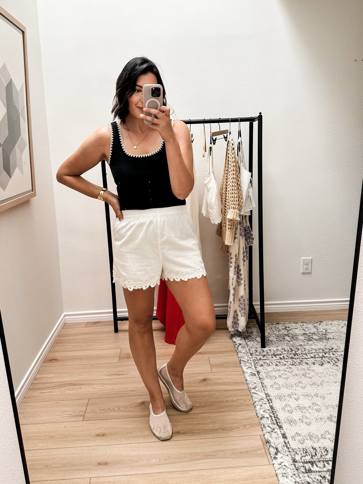 This tank is adorable! It comes in other colors but I loved the contrast of the black and the ivory stitching. I am in the large – I’d say I’m in between sizes of a medium and large. Mainly in length, I’d say. It’s not too short but I think a medium would be a touch shorter on me with my long torso / boobs mix. So keep that in mind! 

Very versatile, as well! Just a cute update to a basic tank.  

I'm in the large of the shorts. They run slightly generous, so you don't have to size up but I like a looser fit with white shorts! Non-sheer. 

 #LTKSummerEdit #LTKOver40 #LTKFindsUnder100