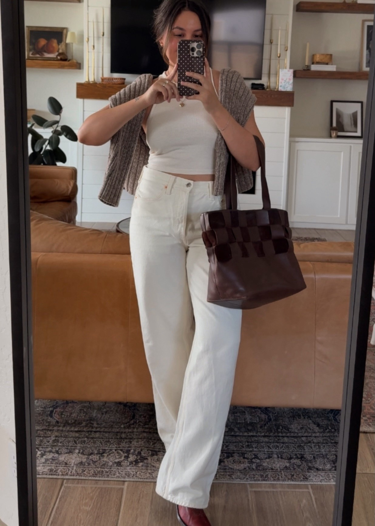 Styling cowboy boots look one! Sizes below:
Tank: M
Jeans: 6 (regular length)
Boots: 7.5 (I went a half size down)
Cardi: M