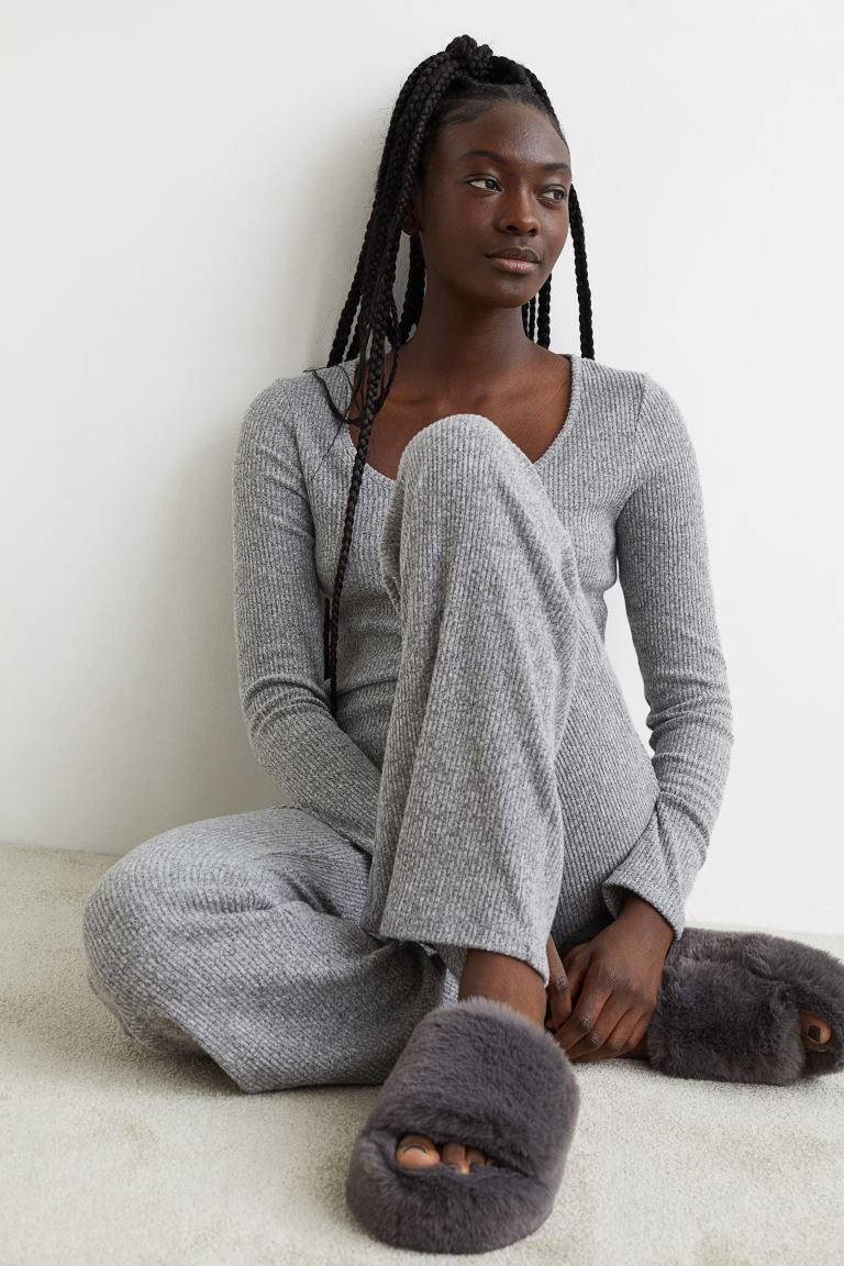 Conscious choice  Pajama top and pants in ribbed jersey with a soft, brushed finish. Top with a l... | H&M (US + CA)