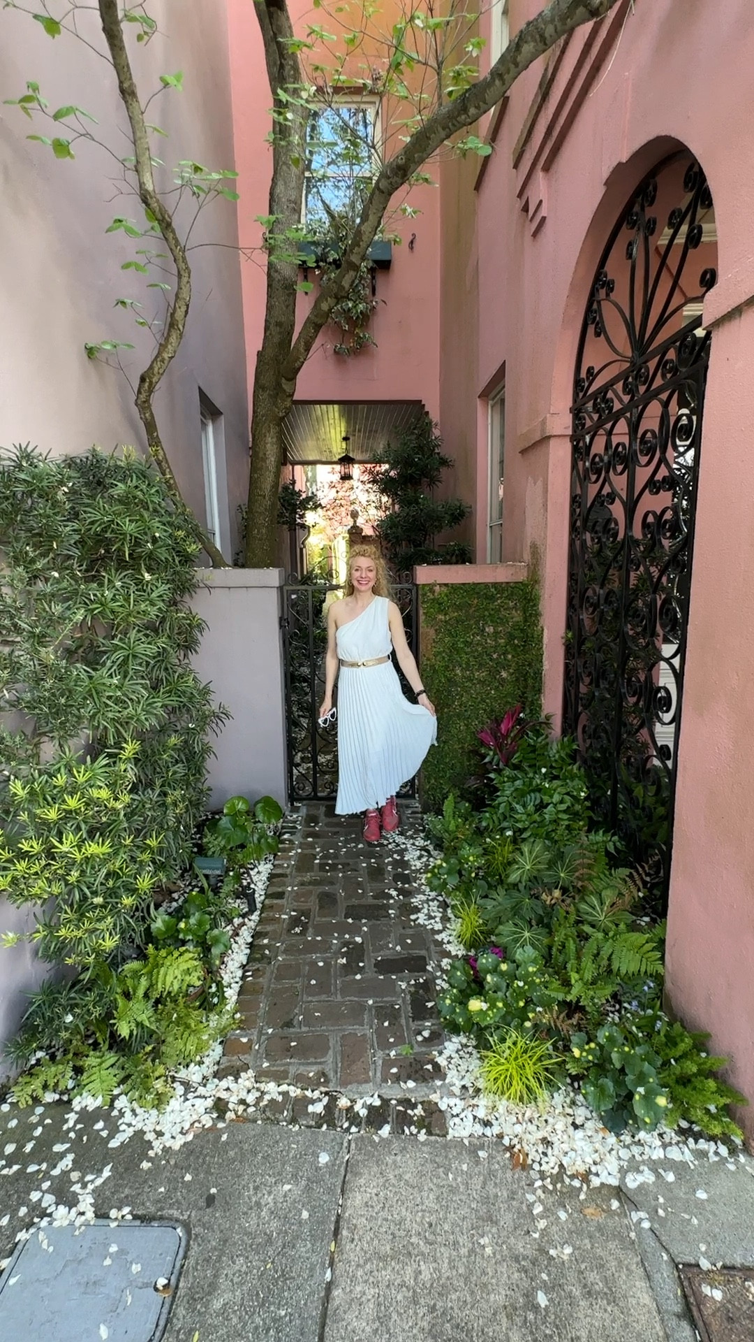 Midlength pleated white dress with one sleeve. Gold belt not included. I like to style my outfits with different accessories. 

#LTKwedding #LTKSeasonal #LTKparties