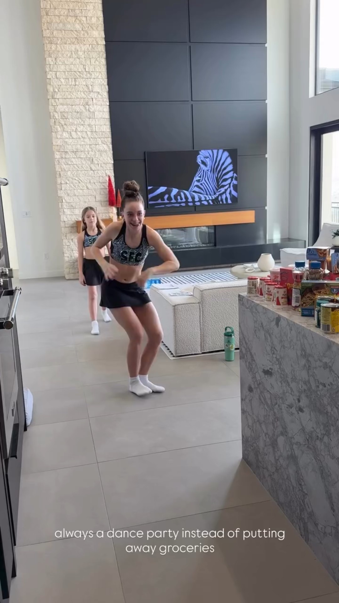 always a dance party instead of putting away groceries