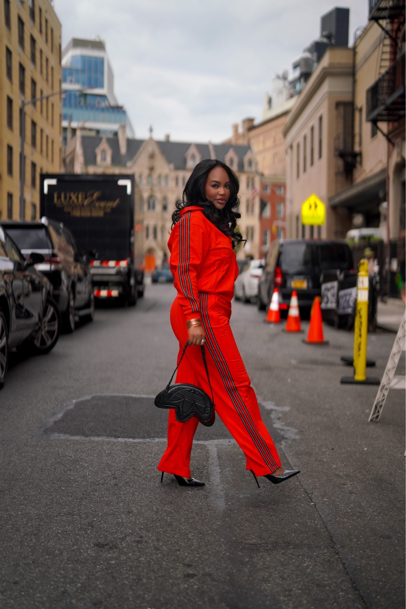 This Adidas set is giving sporty with a little edge ❤️ I love the bold red, stripe detailing and how easy it is to dress up with heels or keep casual with sneakers. Perfect for travel days, errands or an elevated everyday look. Wearing a size Small.

#LTKootd #LTKgrwm #LTKActive