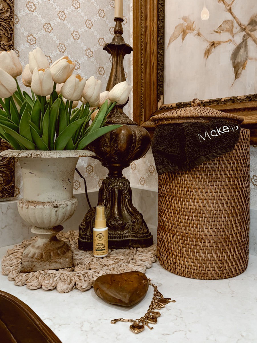 I styled this corner of our bathroom. Their our functional items such as the basket to hold our makeup towels, a spot for my immune support so I remember to take it, as well as my new charm bracelet that adds to the decor when I am not wearing it.  

 #LTKValentine #LTKSeasonal #LTKHome