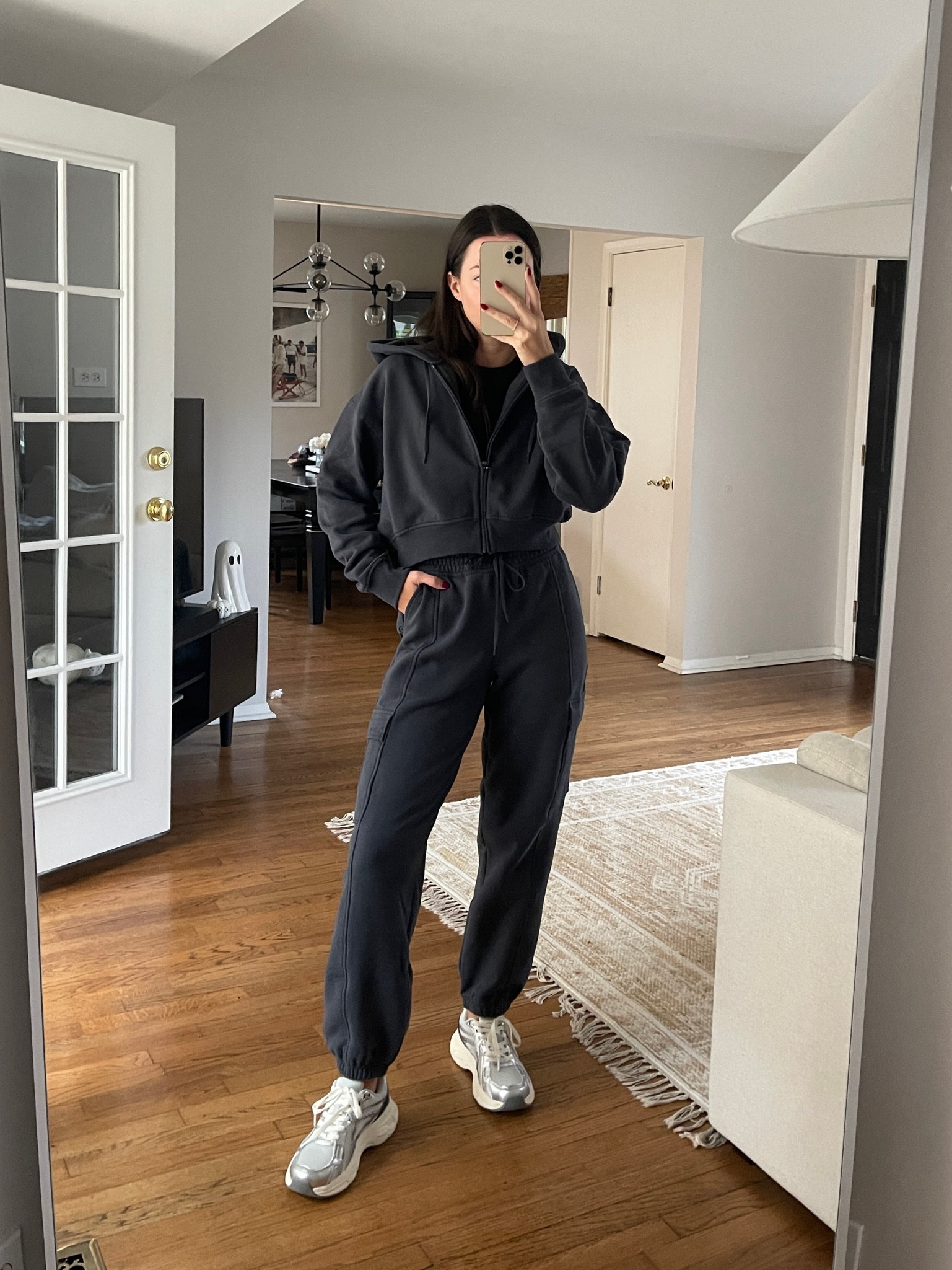 Rainy day cozy outfit while I knock out computer work! Wearing an XS in the cargo sweatpants and cropped zip hoodie, and a S in the tee underneath! Shoes are TTS, extremely comfy, and on sale for $22 today 10/31/24! 

#LTKSeasonal #LTKActive #LTKFindsUnder50