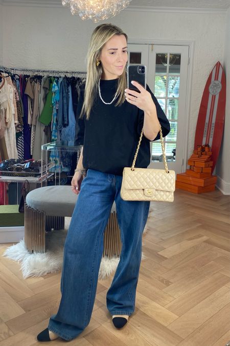 Amazon Fall Outfit. This look is on trend with the quiet luxury trend for Fall. This oversized black tee is so comfortable and I paired it with these Amazon pearls, Amazon jeans, and amazon Chanel like shoes. These shoes run true to size. 

#LTKstyletip #LTKshoecrush #LTKxPrime