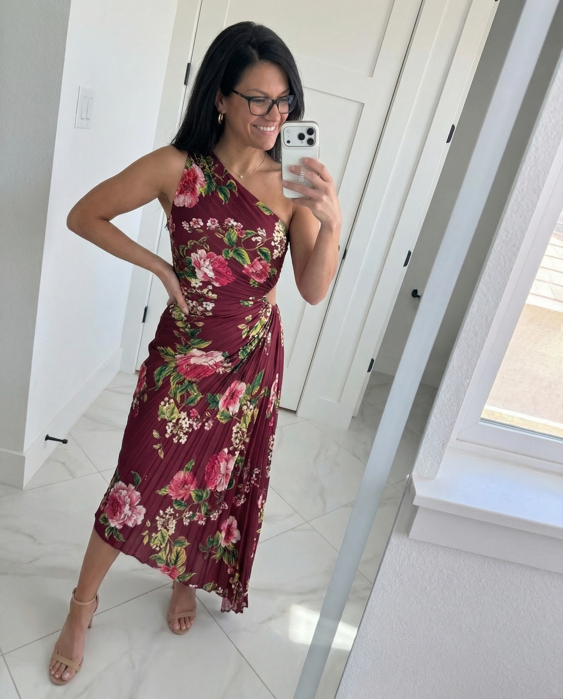 This dress stopped me in my tracks and I think it'll stop you too 🌸 The one-shoulder neckline, the ruched waist, the pleated floral midi — it's giving wedding guest perfection. Linked on LTK — trust me, you need it! 

 #LTKgrwm #LTKootd #LTKPetite