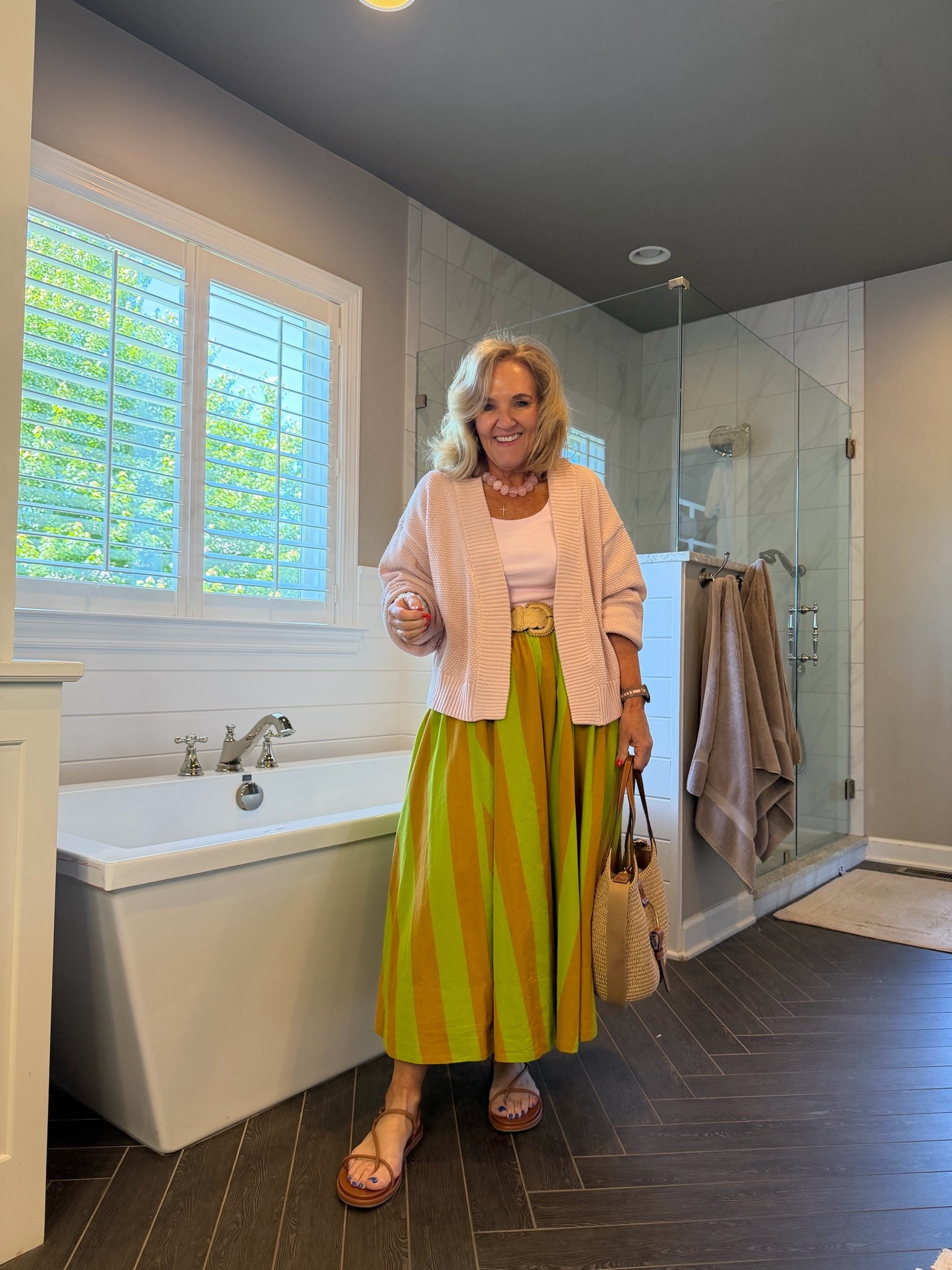 Blush cardigan restocked! Size medium for a relaxed fit 
Tank size medium 
Skirt I sized down to a small 
Summer outfit 
20% off my bracelets code NANETTE20

#LTKOver40 #LTKootd #LTKTravel