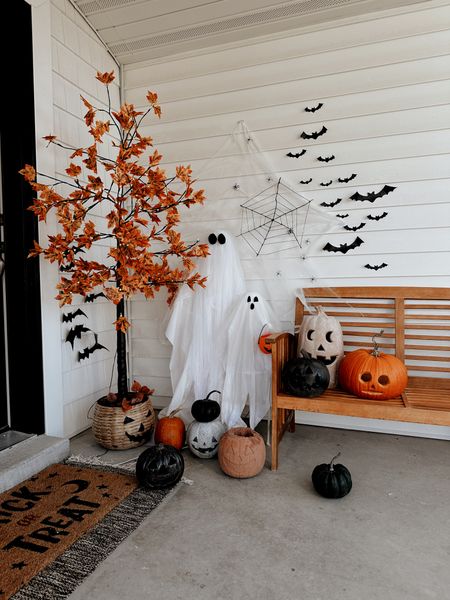 Last minute Halloween porch decor ideas! Linked outdoor ghosts from Pottery Barn. My Jack O Lanterns, glitter bats, and my pre lit Amazon tree! 

#LTKHalloween #LTKSeasonal #LTKhome