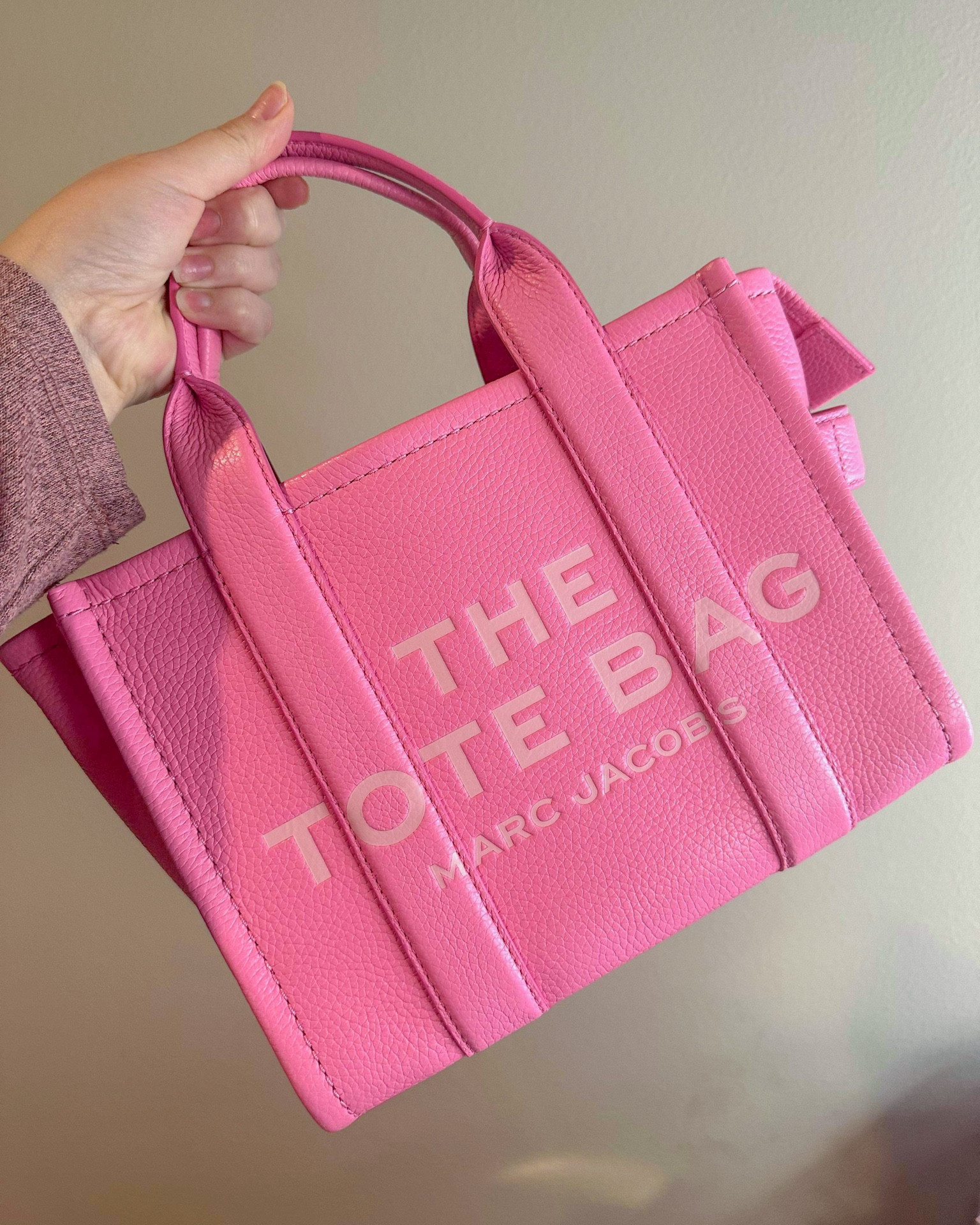 The new Marc Jacobs tote bag in the color Petal Pink 💖 the perfect spring and summer bag! This one pictured is the size small 💖 *chefs kiss 💋 

#LTKMostLoved #LTKitbag #LTKbeauty
