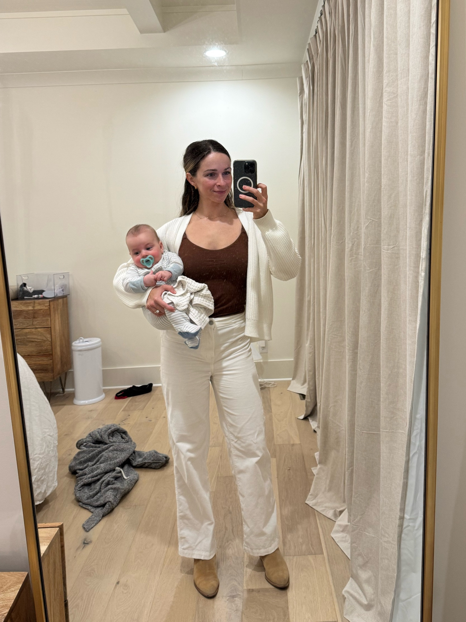 Still loving these corduroy pants from Madewell. I sized down to a 26 in the pants. Wearing a small for the Quince cardigan and Aerie nursing tank. 

#LTKBaby #LTKFamily #LTKSeasonal