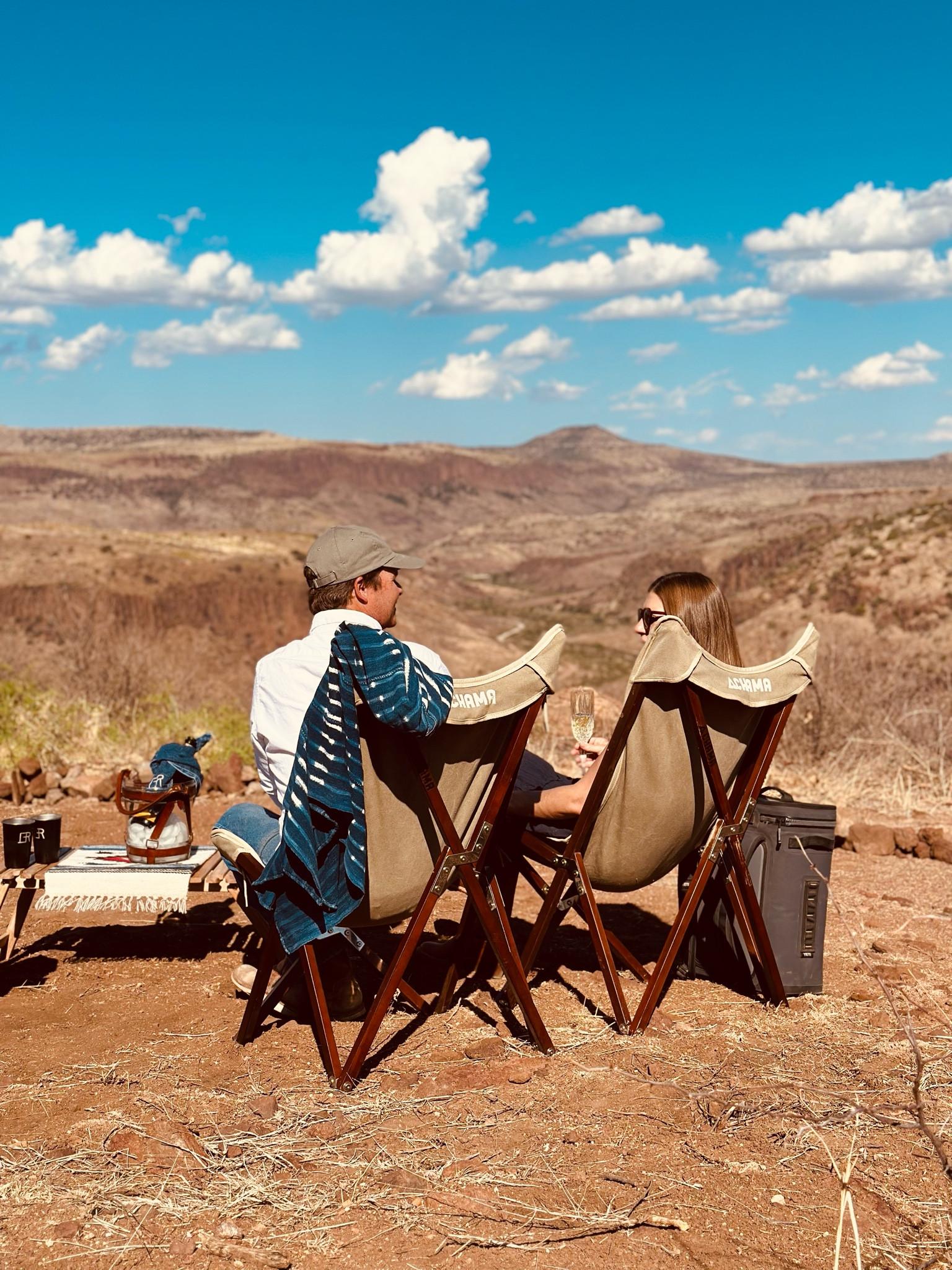 We love hosting at the ranch, especially for some of our favorite people who just got engaged! I set up a surprise happy hour on the mountain using staple pieces that I use often - I look for items that mix and match well and this came together beautifully.

We use these vaquero chairs all the time and they really make a statement. They come with a sling carry bag and are super light weight so they make for easy travel.

#LTKstyletip #LTKfamily #LTKhome