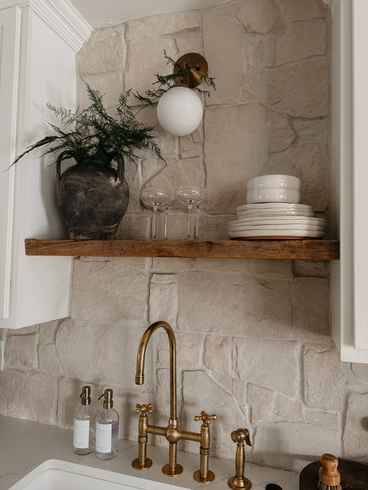 Kitchen sink styling! I love this 3 handled unique vase with my preserved ferns to last all winter! Brass kitchen faucet. 

#LTKHoliday #LTKHome #LTKSeasonal