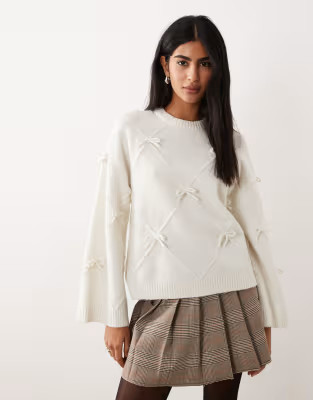 Gina Tricot knitted bow sweater in cream | ASOS (Global)