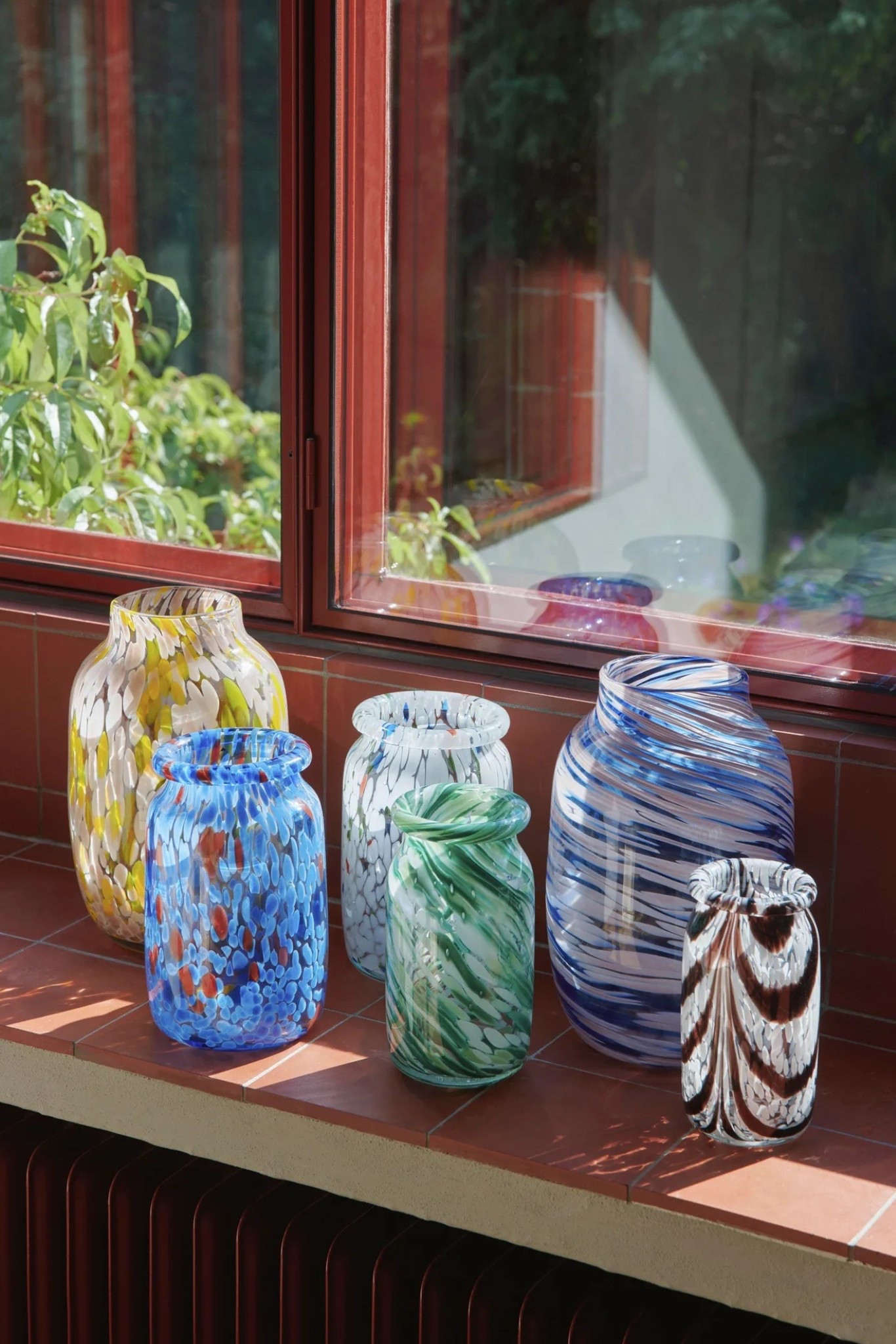 Obsessed with these swirl glass vases. Filled with flowers, left empty on their own, or styled together - the colours bring such joy 🌈 

#LTKgiftguide #LTKhome #LTKuk