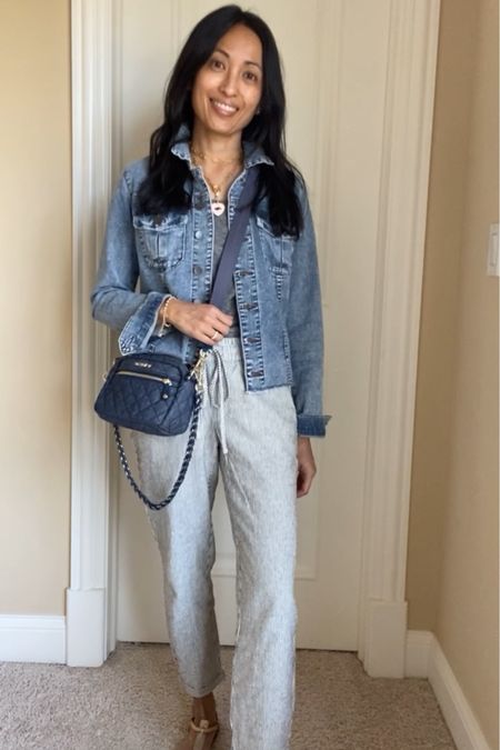 Spring outfit. Vacation outfit. Classic style. Linen blend pants on sale for around $39. True to size or size down. I took regular length at 5’4. Tank top is 25% off with code INSIDERS. Denim jacket true to size. Thong sandals true to size. 
Denim handbag is so cute!
Necklace with charm is stunning. Code NAOMI20 to save. 
Beaded bracelet is an everyday favorite.  Code HINTOFGLAM to save. 


Follow my shop @ahintofglameveryday on the @shop.LTK app to shop this post and get my exclusive app-only content!

#liketkit #LTKitbag #LTKfindsunder50 #LTKsalealert
@shop.ltk
https://liketk.it/4BhYQ