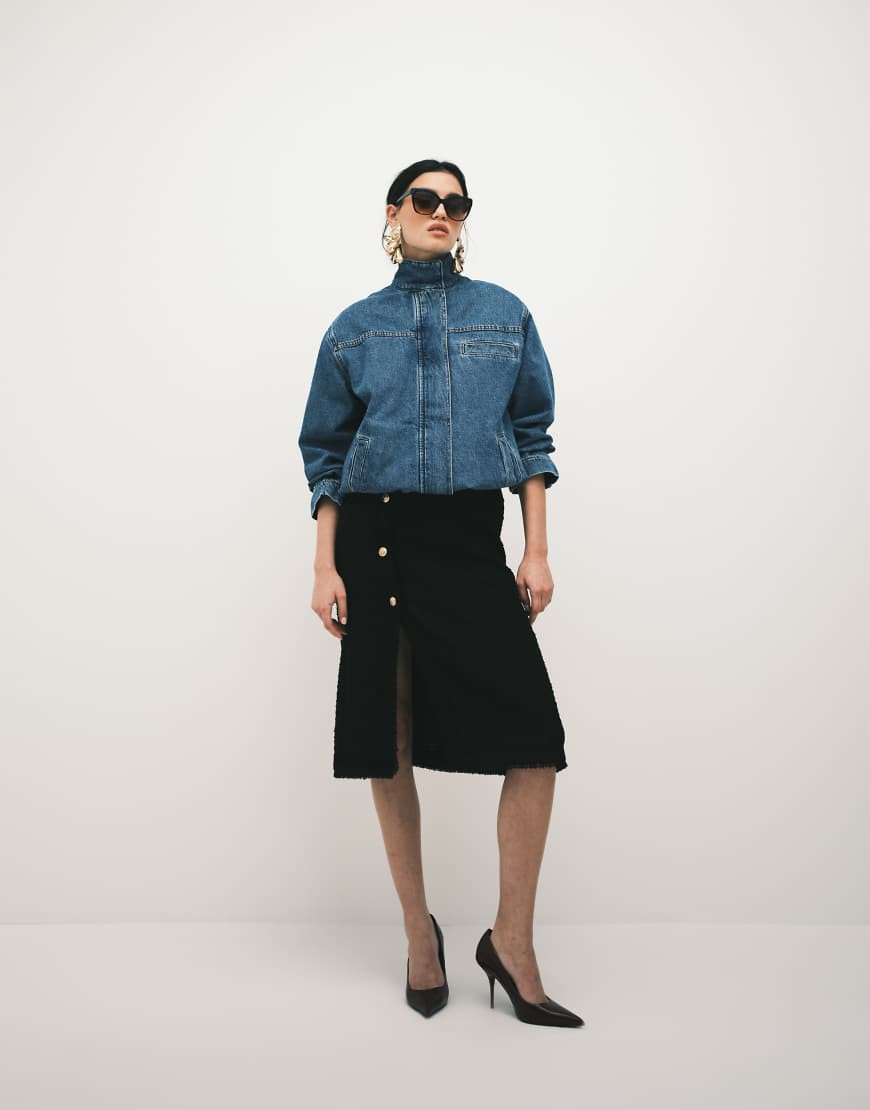 ASOS DESIGN low rise awkward length bouclé skirt in black | ASOS (Global)