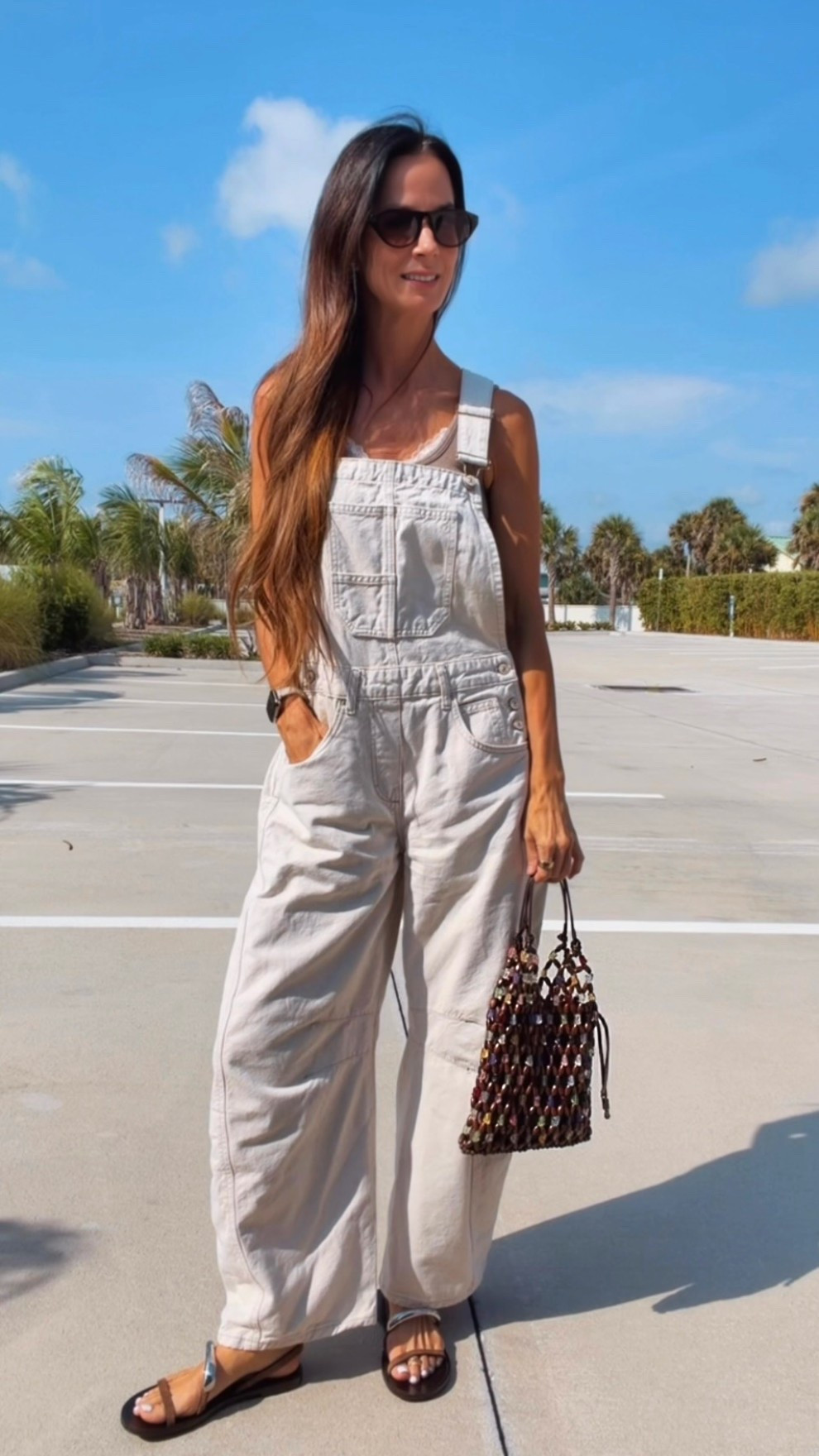 Some outfits just do all the work for you. 🤍

These barrel overalls are giving effortless, and this beaded bag is the little pop that makes the whole look feel extra fun. Throw on a lace tank, comfy sandals, oversized sunnies, and suddenly running errands feels like a fashion moment.

Proof that casual doesn’t have to be boring. ✨

#OOTD #SummerStyle #CasualChic #OverallsStyle #NicoleColeeStyle

#LTKdayinmylife #LTKgrwm #LTKootd