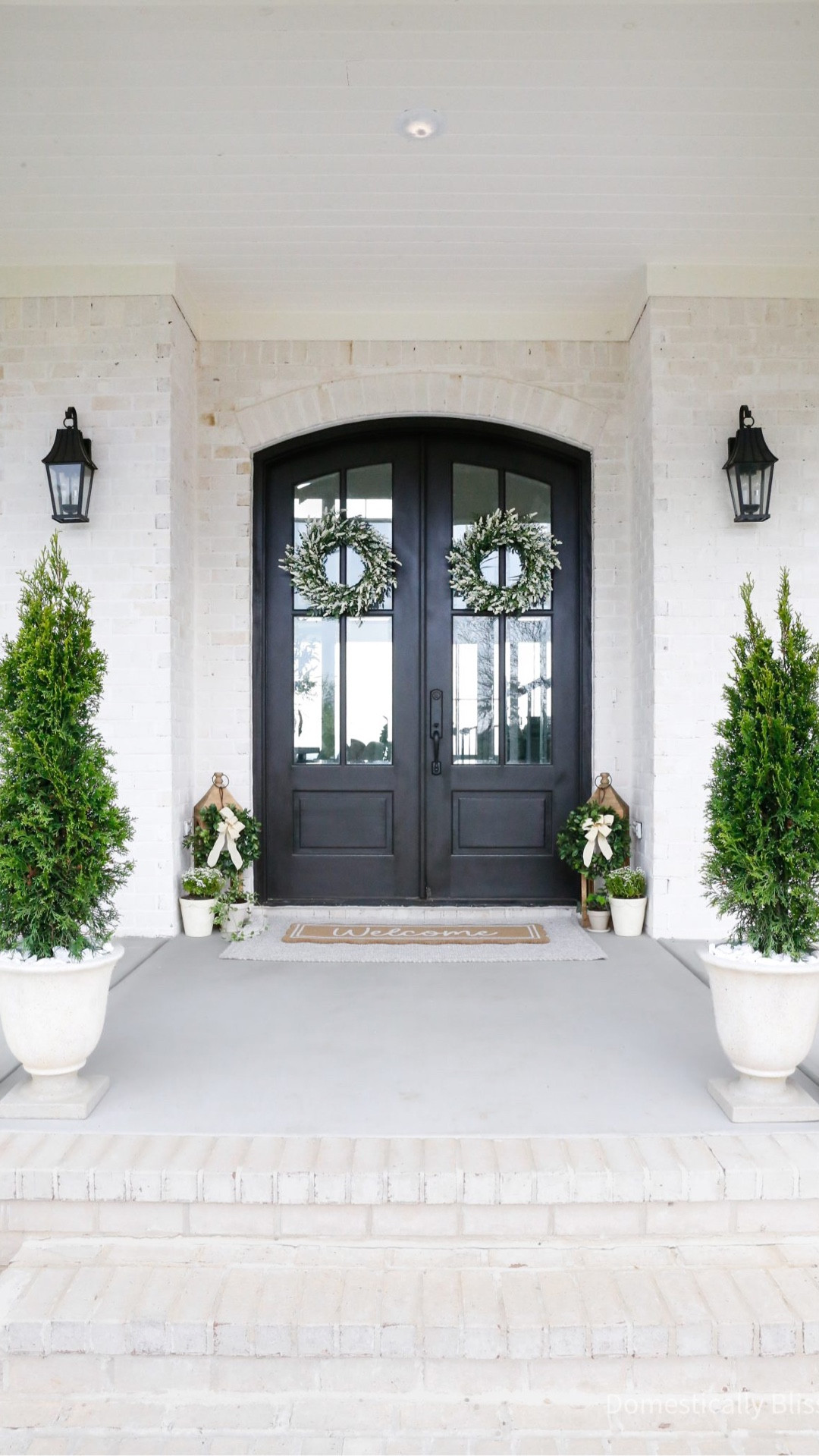 Something I have been doing for years is placing plants in planters without removing them from their original plastic planters, and placing marble rocks on top. 
The first time I shared this, it went crazy viral, and people had a lot to say (especially those who didn’t read the caption)!
I have many reasons for doing this on my front porch, one of which is that I love shopping for plants! 
It’s so much fun to pick out plants, enjoy them all season long, and then swap them out for something new!
But before you get upset, this setup is very temporary, and these plants won't be tossed once the season is over. 
Oh no! We’ve already got plans for them. We have four of these on our front porch, and they will be planted around our 2-story shed (which we got last fall) once this fall rolls around.
And once we have cooler weather, I plan on replacing all these trees with mums. 
So not only do I get to enjoy them on my porch, but I’ll also get to watch them grow in our yard.
And then I get to get all new plants for our front porch and enjoy something new for a time.
But why not just fill it with dirt? Mainly because dirt is messy. But also, have you seen the cost of good dirt these days? I’d rather save it for when we plant them in the ground and give them a good fertilizing then.
And for those who are worried this is bad for the plant, a nursery left a comment on my previous video years ago and said, “For those worried the tree won’t survive. They sit for years in these pots where they are produced, & again for months & years at Garden Centers. The caption makes clear that this is for a temporary display & will be planted out properly when the season changes. We think it’s a great idea.”
And I have to agree, as this is the front porch trick that I go back to year after year! 
Ps. I repurposed a pool noodle (this is the second time I’ve done this) around the edges so I wouldn’t have to fill it with rocks, and they could just sit on top of the noodles.



#LTKmomlife #LTKSeasonal #LTKHome