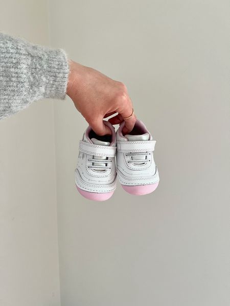 We took Isabel to pick out her very first pair of sneakers this weekend. She’s a girl after my own heart and chose this neutral white and pink pair with a cute little cloud design on the side.

We took Eleanor to pick out her very first pair too and she chose these bright blue and pink sparkly things. We loved them though and they hold such a sweet sentimental place in our hearts. Now these will too!

Very excited for Baby Bel to get walking in these! She’s so fast already. Wish us luck 🤪

#LTKBaby #LTKShoeCrush #LTKFamily