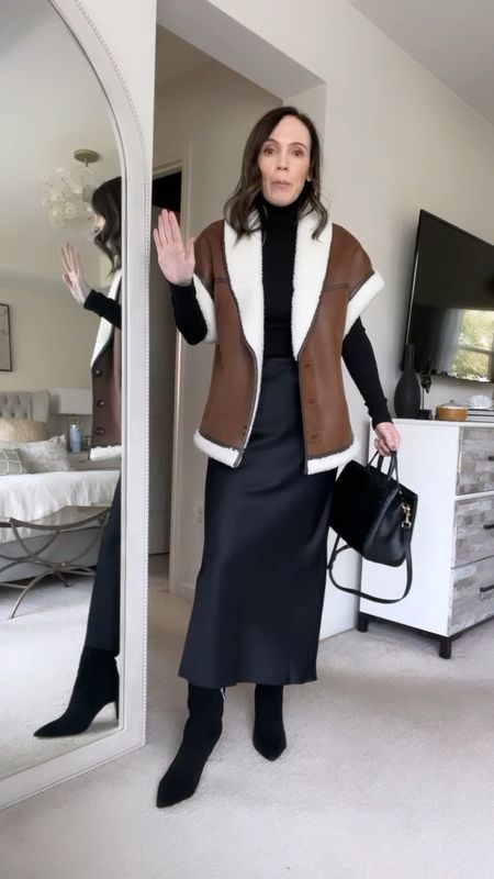 Styling a slip skirt for winter! I love it worn with this faux shearling vest and suede knee high boots. This would also be great for the office

#LTKworkwear #LTKover40 #LTKstyletip