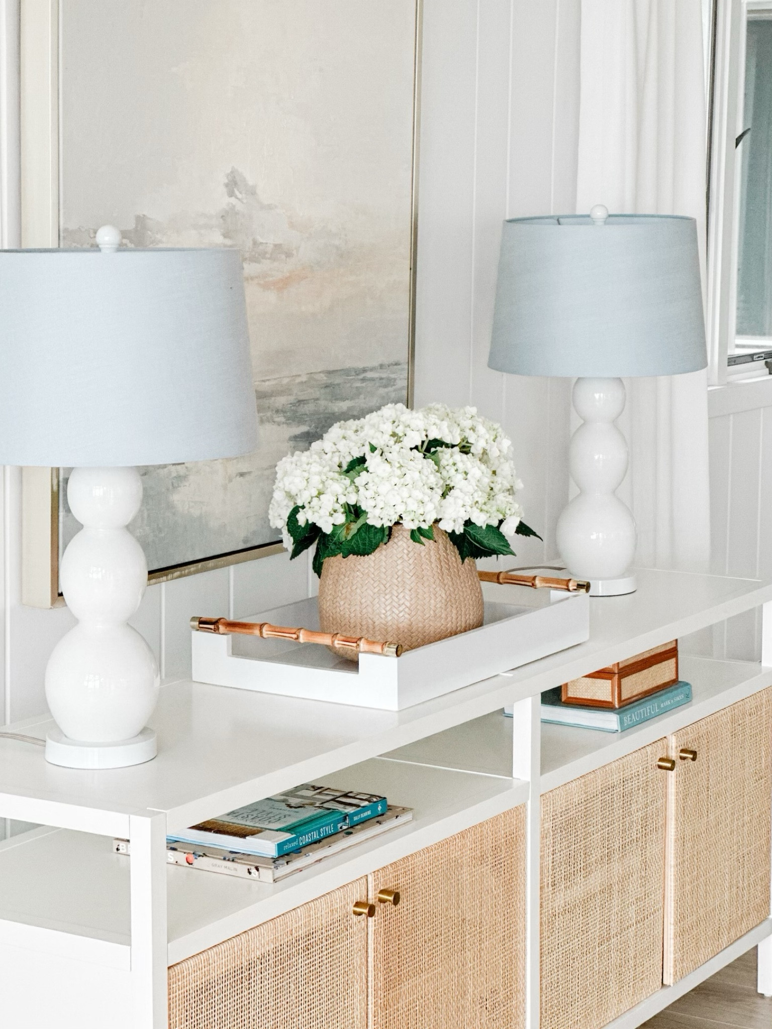 Coastal decor, target find, sale alert, coastal console, diy, beach house furniture, beach house, white lamps, pale blue lamp shade, rattan console, studio McGee for target, coastal living room, entry table, tv console

#LTKhome #LTKsalealert