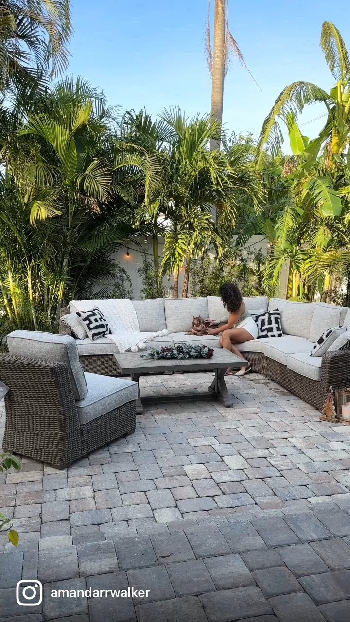 Perks of living in the Sunshine State ☀️  This Christmas will be warm and cozy with @ashleyofficial! 🎅🎄 We set up our new outdoor set this weekend and we are absolutely in love with how the Beachcroft sectional, table + chair combo elevated our space and made it usable to enjoy the cooler months in Florida! Our foster pup tested the fabric and confirmed it is doggy approved - soft and comfortable but durable as well! Linking this set in my LTK for easy shopping to upgrade your space for the holidays!

#AshleyPartner #MagicOfHome

#LTKfamily #LTKhome