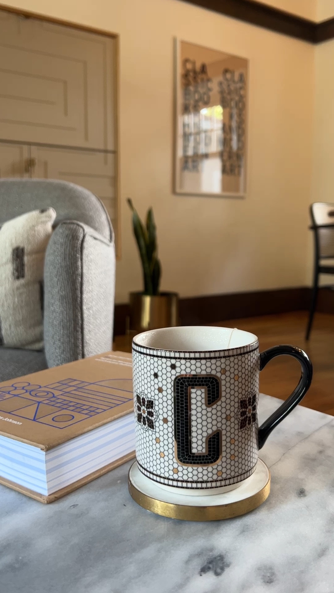 One of our favorite monogram mugs from Anthropologie. Love the Parisian look and gold detailing to complement our marble coasters and table. Great for tea in the afternoon with a good book!

#LTKFind #LTKhome #LTKstyletip