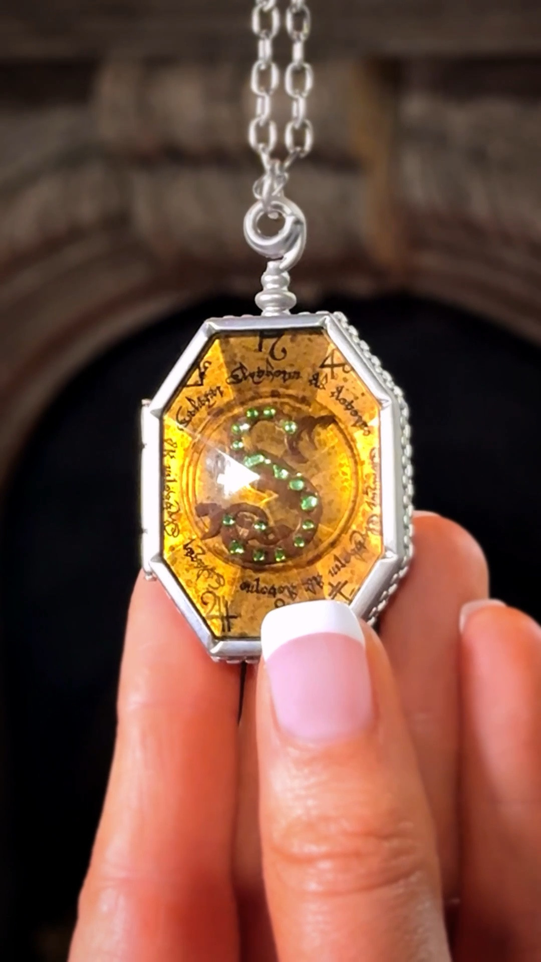 Slytherin locket by Noble Collection...