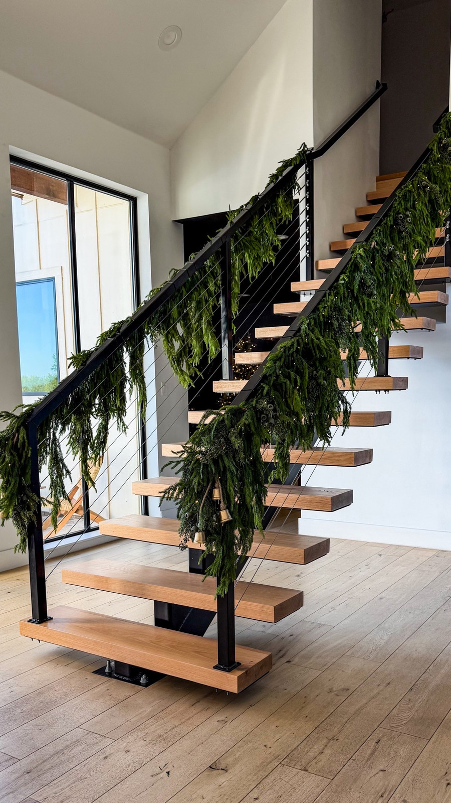 I used eight of the Norfolk Pine Deluxe Garlands and added in a few Mixed Cypress…