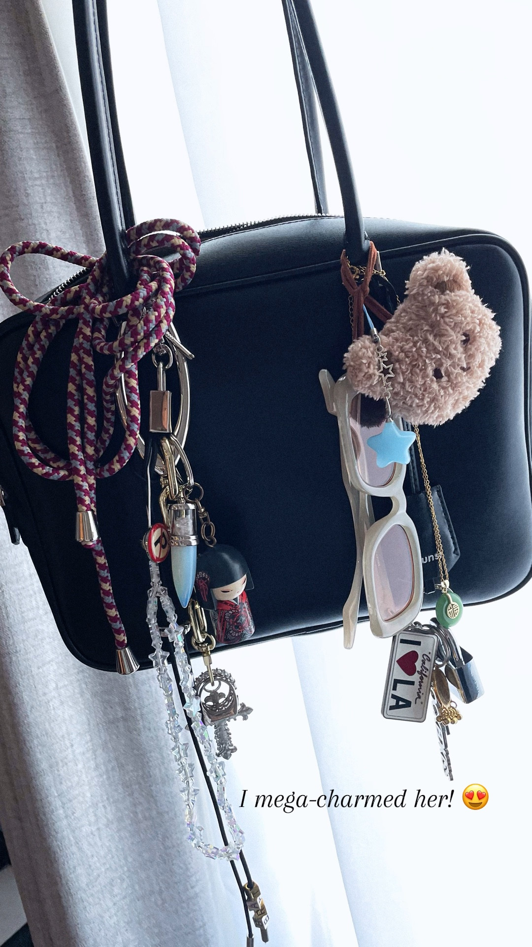 She’s here!! Dunst classic 28 - a beautiful alternative and dupe to the miu miu beau bag - slightly smaller and can fit an iPad Air. I love it and it’s been elevating casual outfits. So fun to accessorize her and add charms to show some character and personality. Ahhh!! My perfect day bag. 
-
Boston bag, bowling bag, square bags, rectangle bag, everyday bags, work bags, daily bags, cute bags, trendy bags, luxury dupe bags, affordable luxury bags, miu miu dupes, miu miu bag dupes, bag charms, bag accessories 

#LTKItBag #LTKVideo #LTKSummerSales