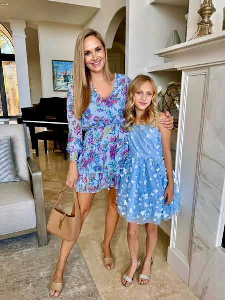 Mommy daughter fashion I'm absolutely loving. I'm wearing a small and this beautiful blue spring dress and my daughter is wearing a size 8 in her butterfly blue spring dress. her dress is under $65.

#LTKfindsunder100 #LTKover40 #LTKkids