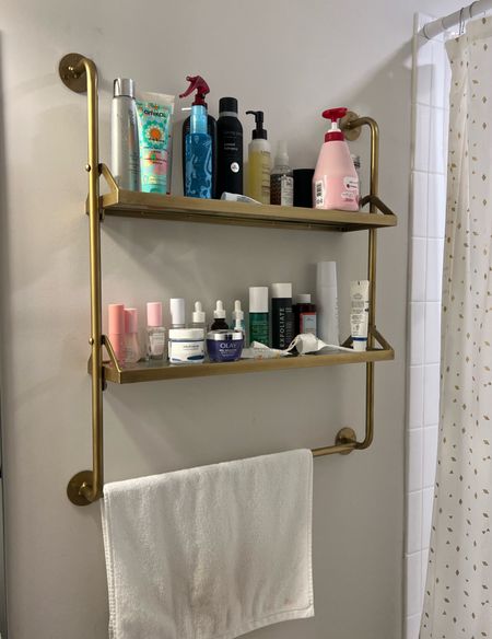 My new bathroom wall shelf! I was specifically looking for one with multiple shelves with a lip to prevent things from falling. While this one doesn’t have a lip per say, the metal frame provides a little bit of height to keep things on the shelves.

#LTKhome