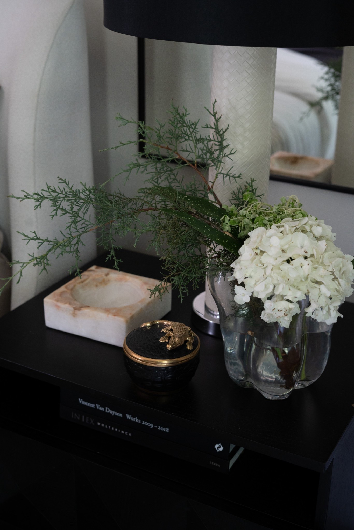 Welcome to my summer bedroom refresh! I wanted this space to feel calm, luxurious, and effortlessly modern, and I’m obsessed with how it turned out. I layered crisp white bedding with black accents for that high-contrast, timeless look I always love in interior design. The black chandelier and matching curtain panels add a dramatic touch, while soft textures like the throw blanket and neutral ottoman keep everything cozy and inviting. A mix of modern art, sculptural decor, and stacked coffee table books gives this room that curated, designer feel without being overdone. If you're looking for bedroom decor ideas or want to create a moody yet minimal space that still feels fresh for summer, this look is proof that black and white is always in style.


#LTKSummerEdit #LTKSeasonal #LTKHome