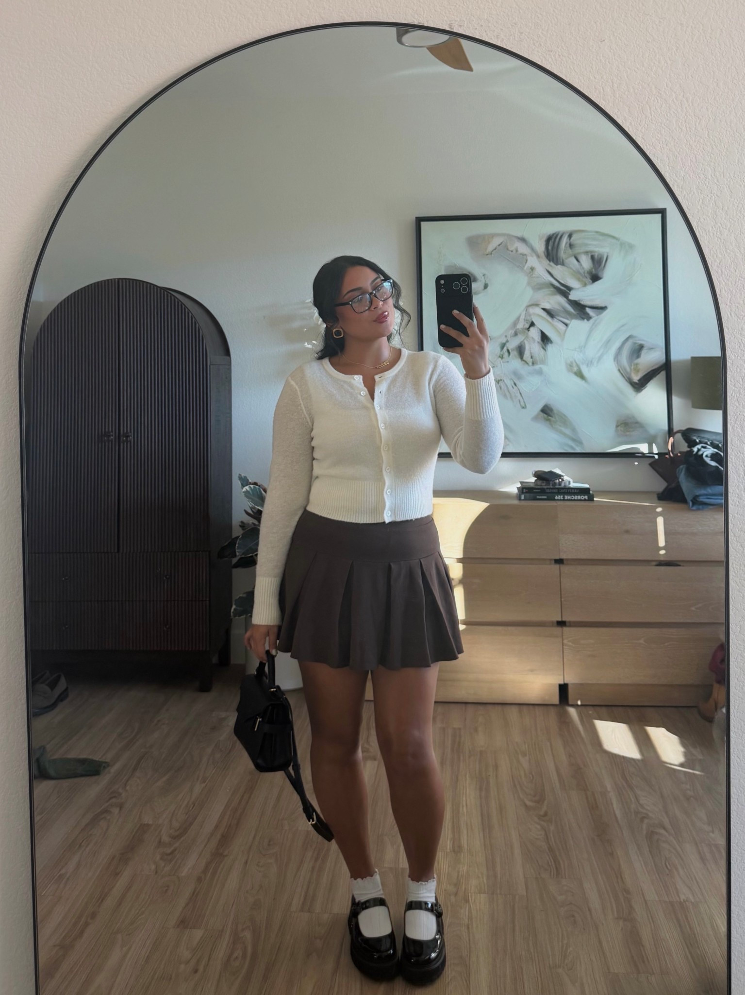 casual fall outfit of the day🤎 prepped edition

Cardigan & skirt (has shorts) are from American Eagle! SO comfy & ways to style in other outfits (both run true to size, wearing a L in both)

*exact cardigan isn’t sold anymore so linked similar, and exact loafers are from Marc Nolan, can’t link here*