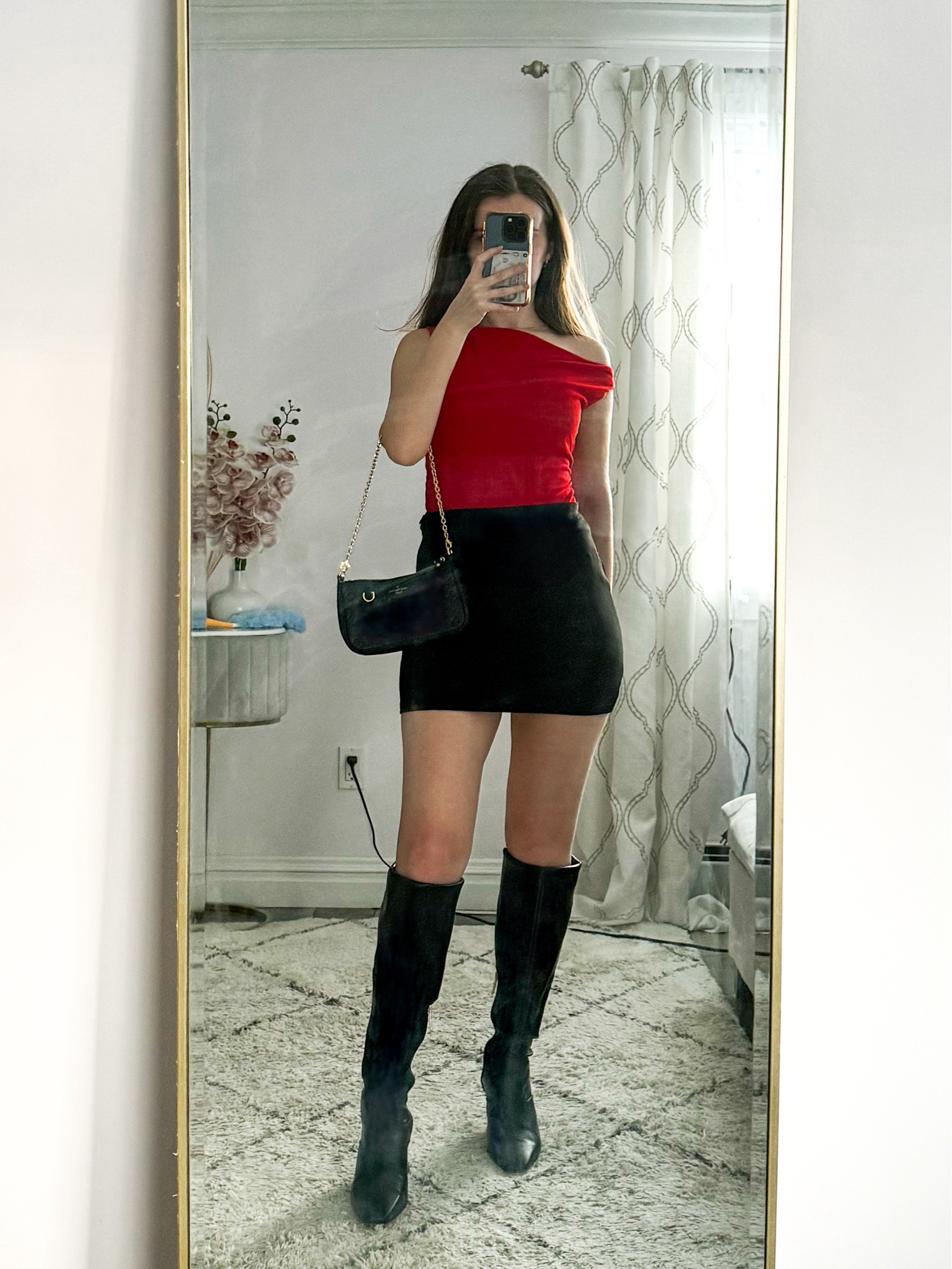 This black mini skirt paired with a red off the shoulder top, black knee high boots, and a sleek shoulder bag is perfect for Valentine’s Day , date nights, or a night out with friends.
.
.
.
.
.
.
Winter outfits | Valentine’s Day outfit | date night outfits | date night top | skirt outfits | skirt and boots | black skirt outfit | mini skirt outfit | winter skirt outfits | cute tops | Valentine’s Day tops | dressy top | going out tops | red top | black boots outfit | tall boots outfit | outfit inspo | outfit ideas 

#LTKSeasonal  #LTKU #LTKSaleAlert #LTKGiftGuide #LTKWorkwear #LTKTravel #LTKShoeCrush #LTKItBag


#LTKFindsUnder50 #LTKFindsUnder100 #LTKStyleTip