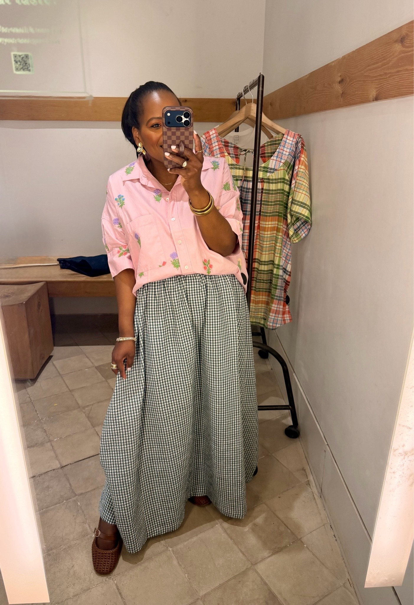 Love pattern mixing!! This floral button up paired with this gingham midi skirt from @Anthropologie is so cute!!

#LTKgrwm #LTKootd #LTKMidsize