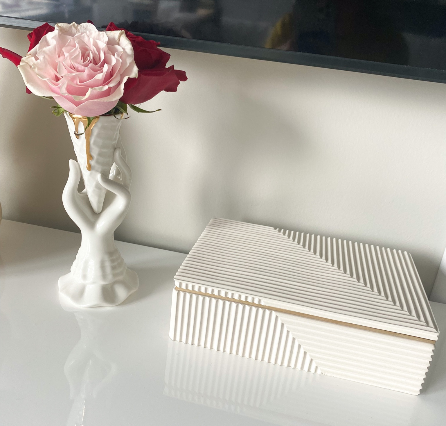 Cutest box to store tv remotes in or just as decor for your coffee table, media console, or entryway table! Little ice cream cone bud vase from Jonathan Adler 🤍

#LTKhome #LTKFind
