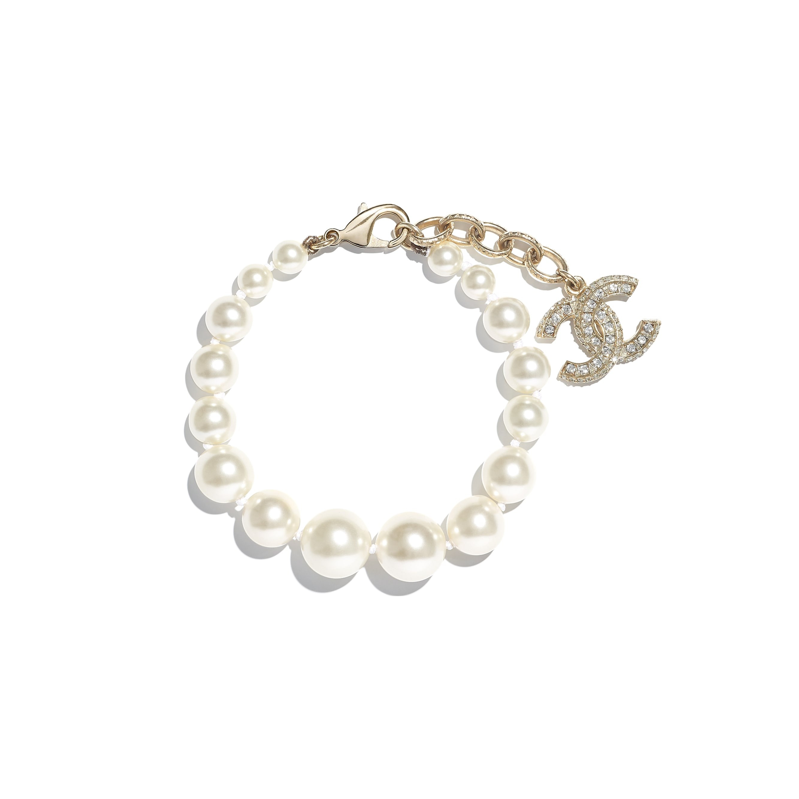 Metal, Glass Pearls, Resin & Strass Gold, Pearly White & Crystal Bracelet | CHANEL | Chanel, Inc. (US)